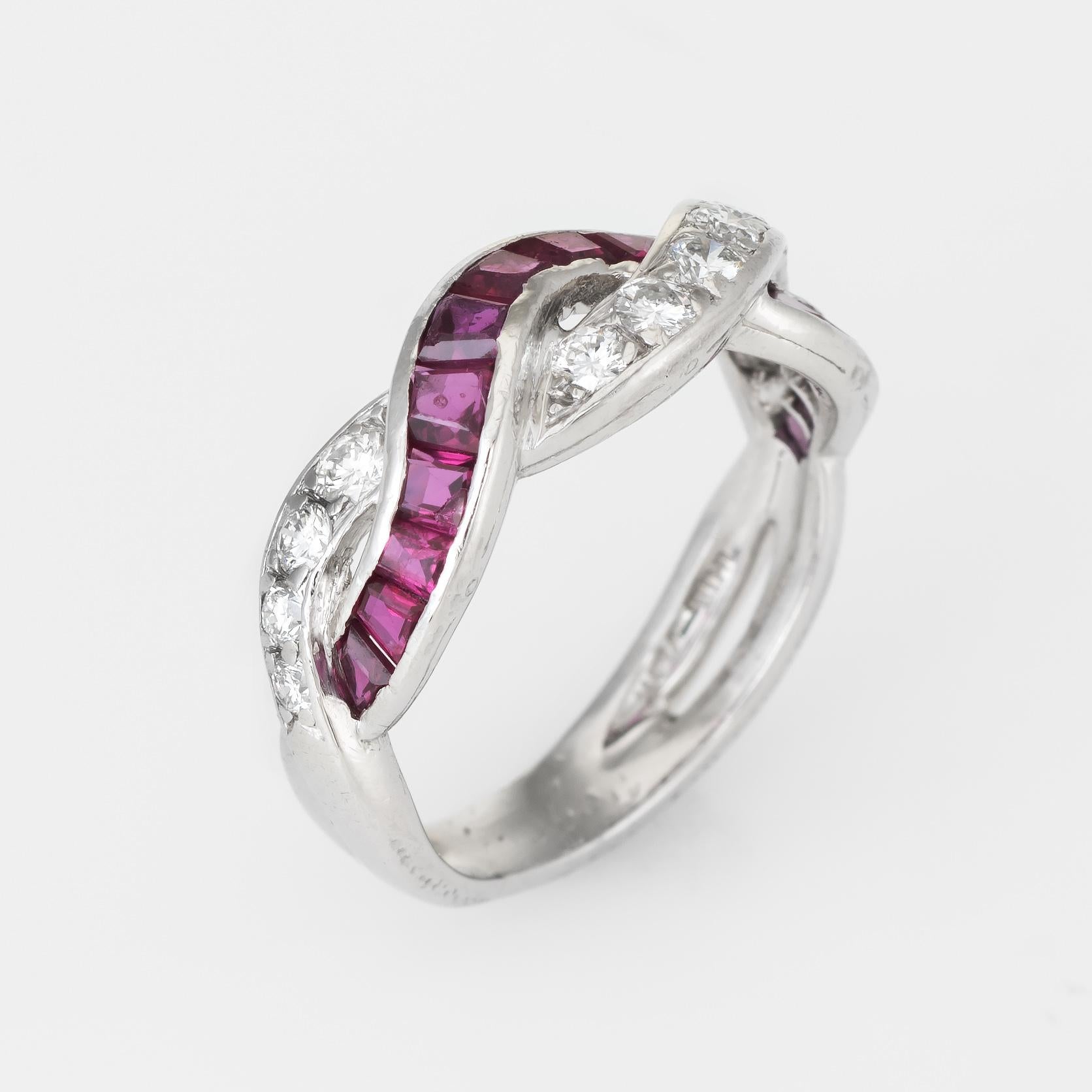 Finely detailed vintage Tiffany & Co band (circa 1950s to 1960s), crafted in 950 platinum. 

Round brilliant cut diamonds total an estimated 0.25 carats, accented with an estimated 0.75 carats of square cut rubies. Note: few light surface abrasions