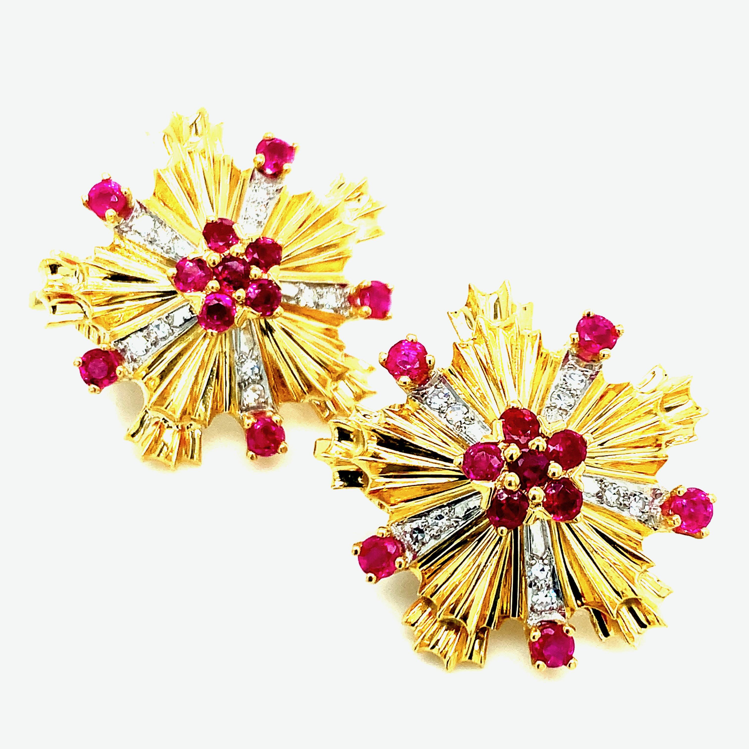 Signed Tiffany & Co., these ear clips are made out of 18 karat yellow gold with diamonds weighing approximately 0.40 carat and rubies weighing approximately 1.5 carat. Total weight: 17.3 grams. Width: 2.3 cm. 

Serial No. PA 2423905 
