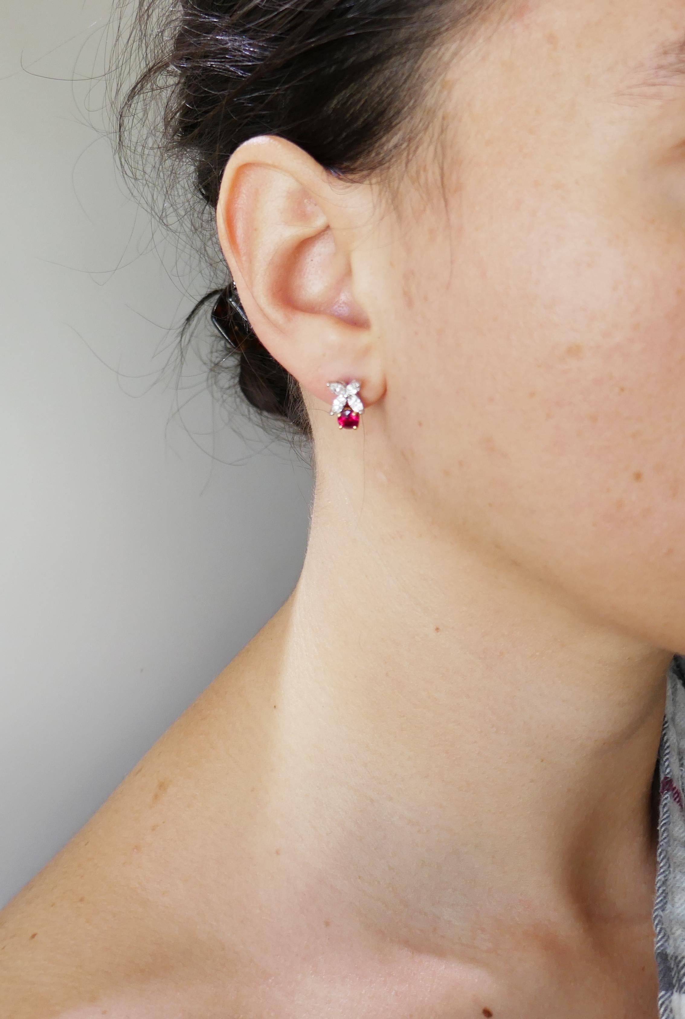 Lovely diamond and platinum stud earrings created by Tiffany & Co. Feminine and wearable, the earrings are a great addition to your jewelry collection.
Each earring made of 18 karat yellow gold and platinum and features one round faceted ruby and