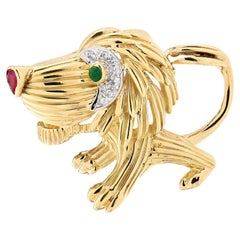 Tiffany 
Co. Ruby, Emerald, 
Diamond Lion Brooch