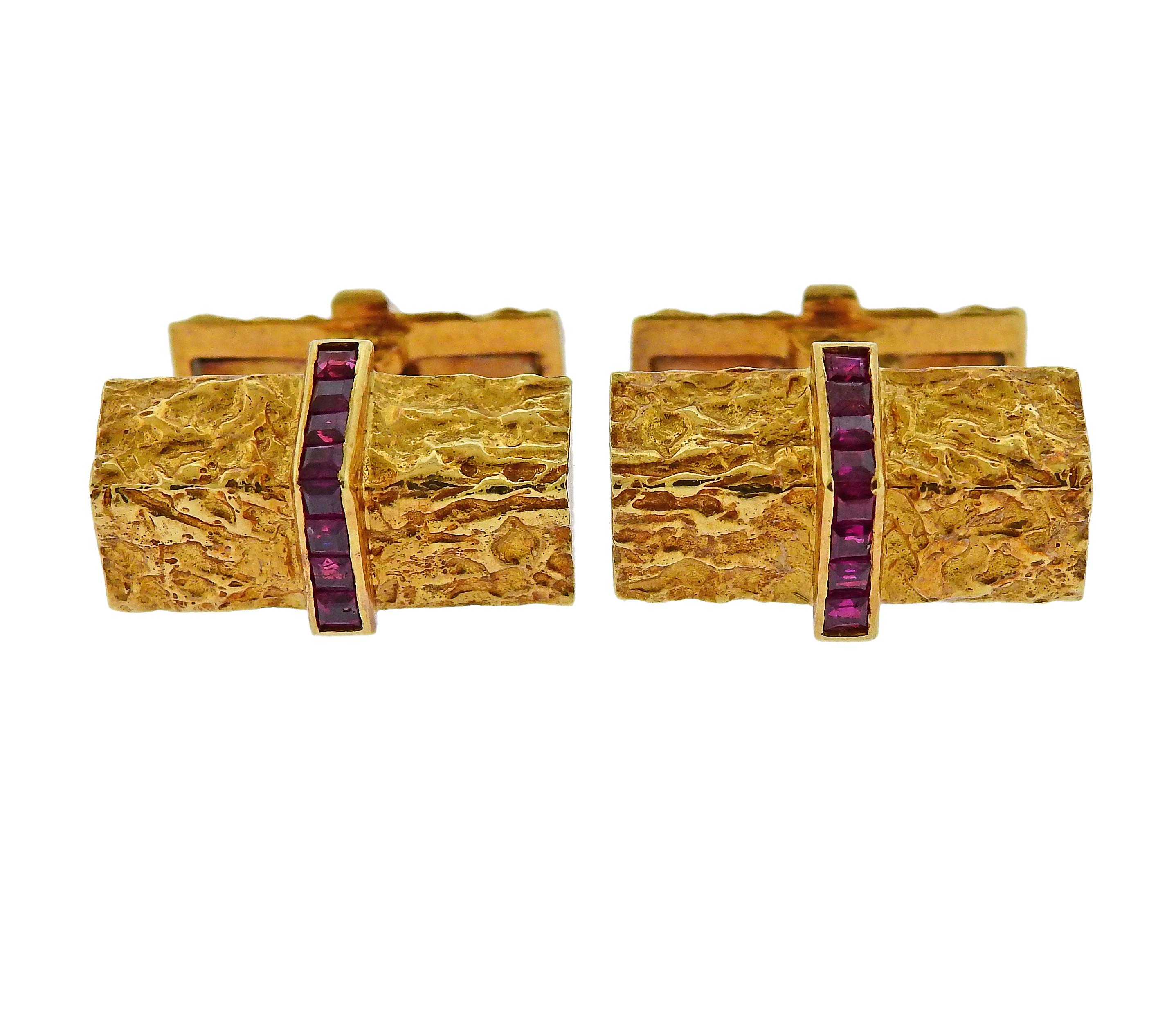 Classic 18k yellow gold cufflinks and studs set by Tiffany& Co, set with rubies. Cufflink top - 21mm x 13mm; back - 18mm x 10mm. Stud top - 12mm x 10mm. Total weight is 29.7 grams. Marked Tiffany & Co, 18k.