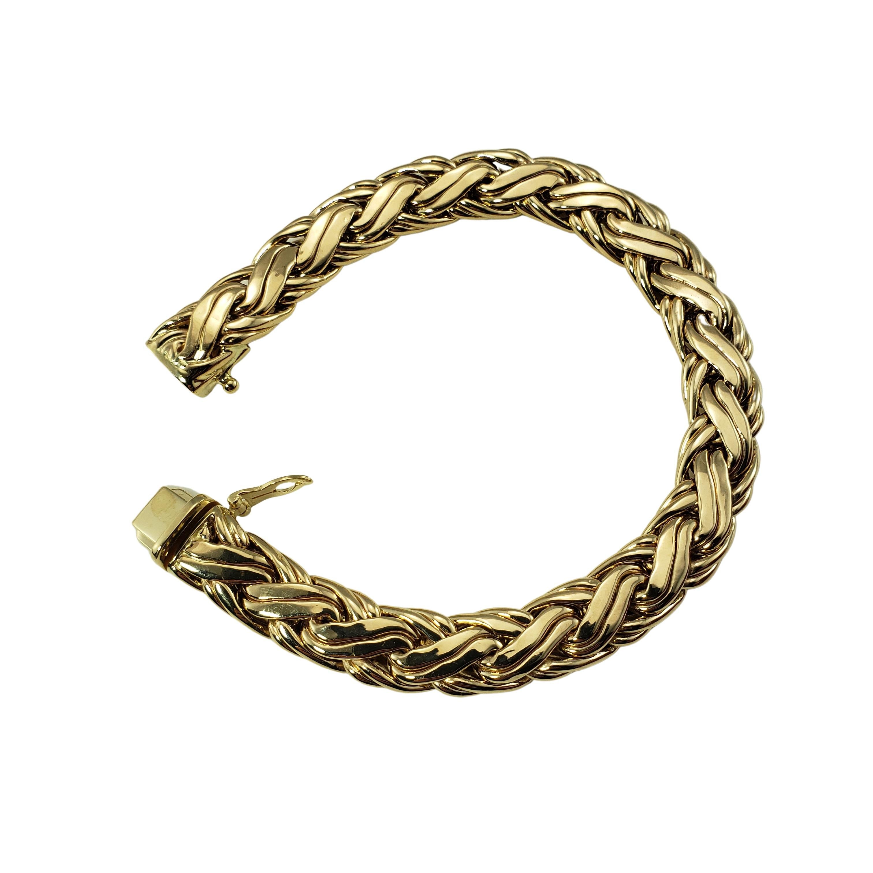 Tiffany & Co. Russian Weave 14 Karat Yellow Gold Bracelet-

This stunning Tiffany weave bracelet is crafted in beautifully detailed 14K yellow gold.  Width:  9 mm.

Size: 6.75 inches

Weight:  16.9 dwt. /  26.4 gr.

Hallmark:  TIFFANY & CO 