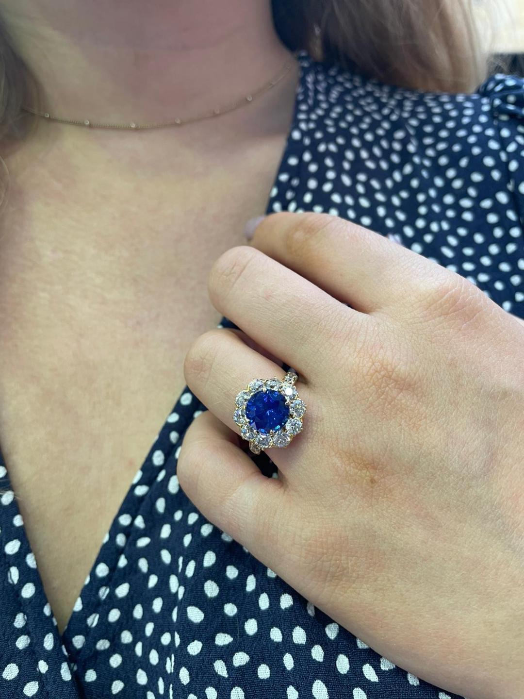 Round Cut Tiffany & Co. Sapphire and Diamond Cluster Engagement Ring, Circa 1960