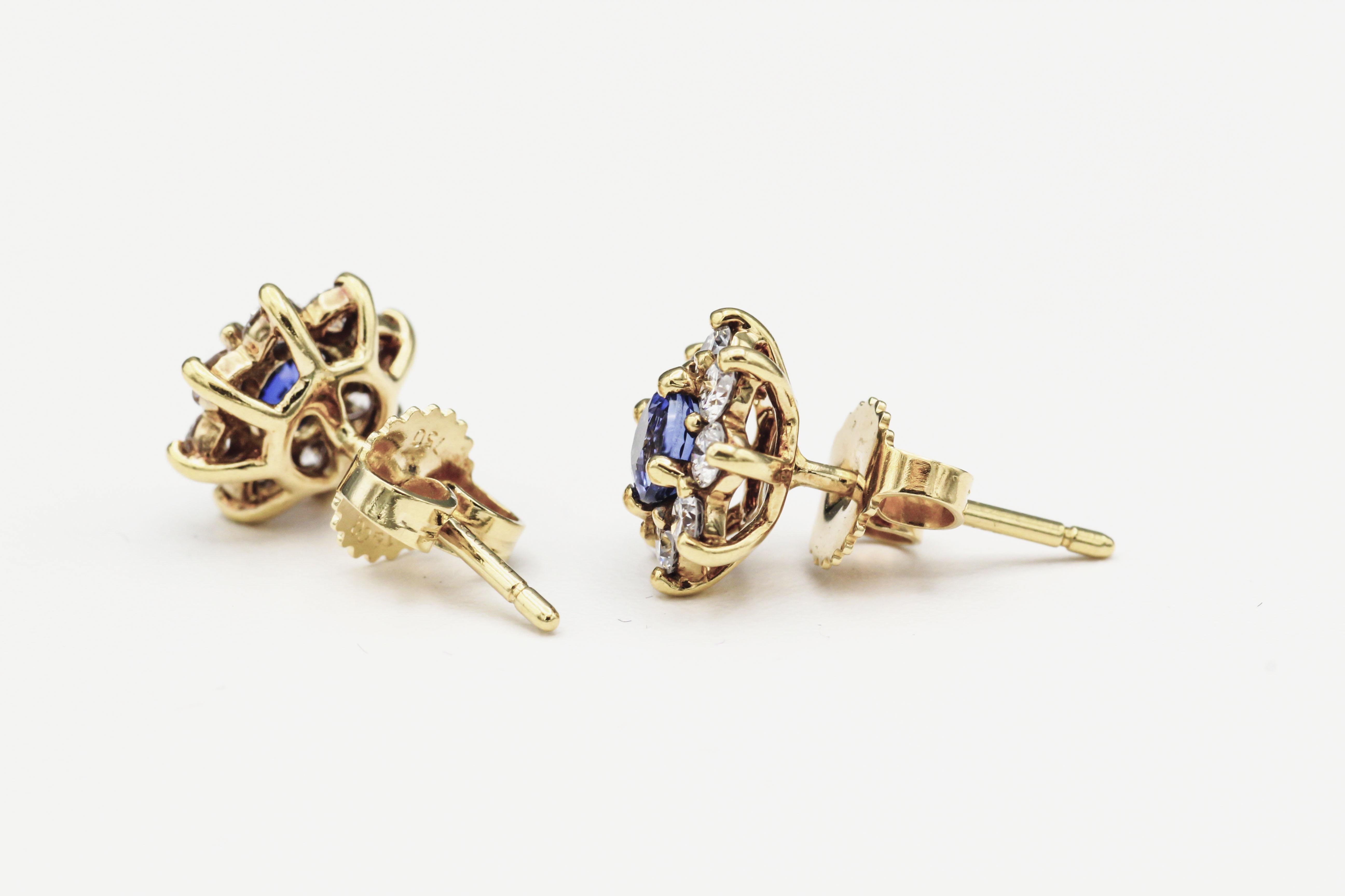 Exemplifying timeless elegance and exceptional craftsmanship, these exquisite Tiffany & Co. Sapphire and Diamond Halo Stud Earrings evoke the grace and sophistication of a bygone era. Crafted in the opulence of 18k yellow gold, these earrings are a
