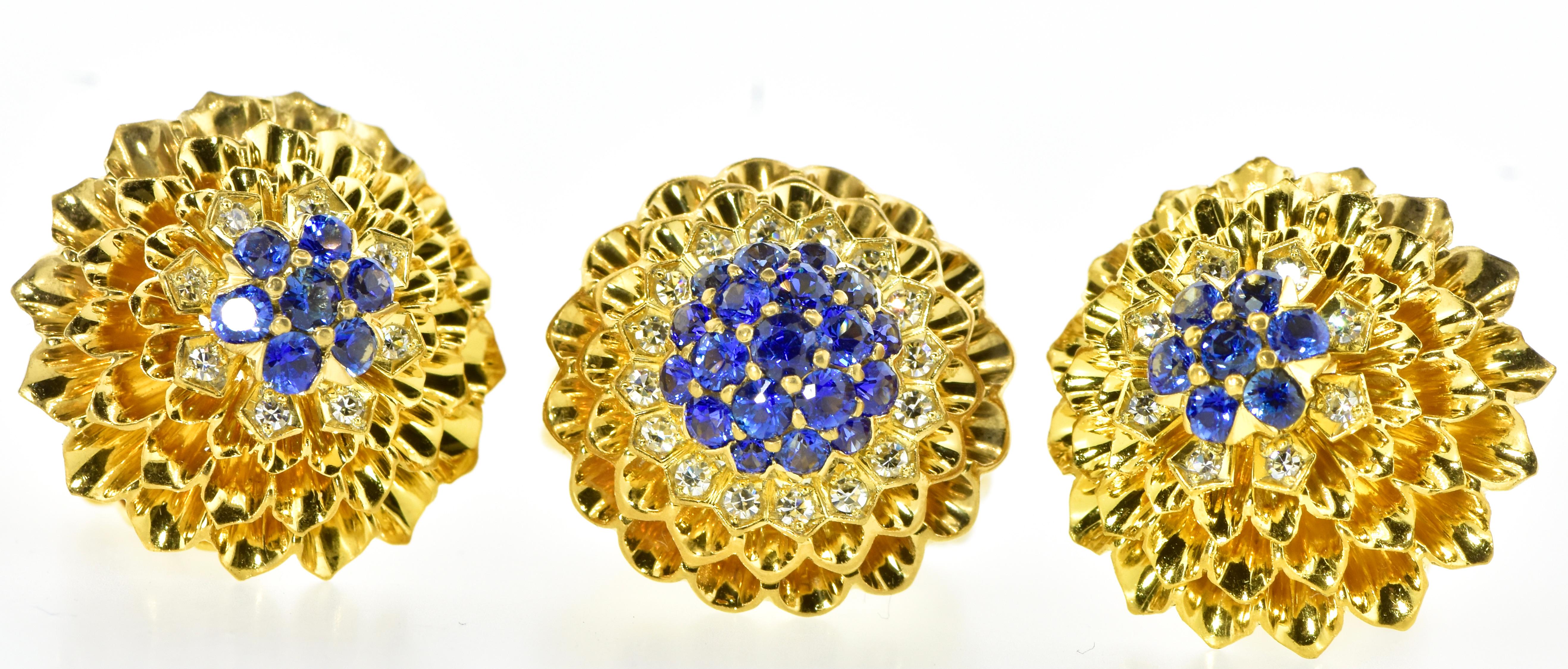 Tiffany Diamond and Sapphire ring and earring set made mid-20th century.  This matching suite of jewelry is in very fine condition.  The 33 bright blue sapphires weigh an estimated 1.90 cts.   Surrounding these round brilliant cut stones are 33