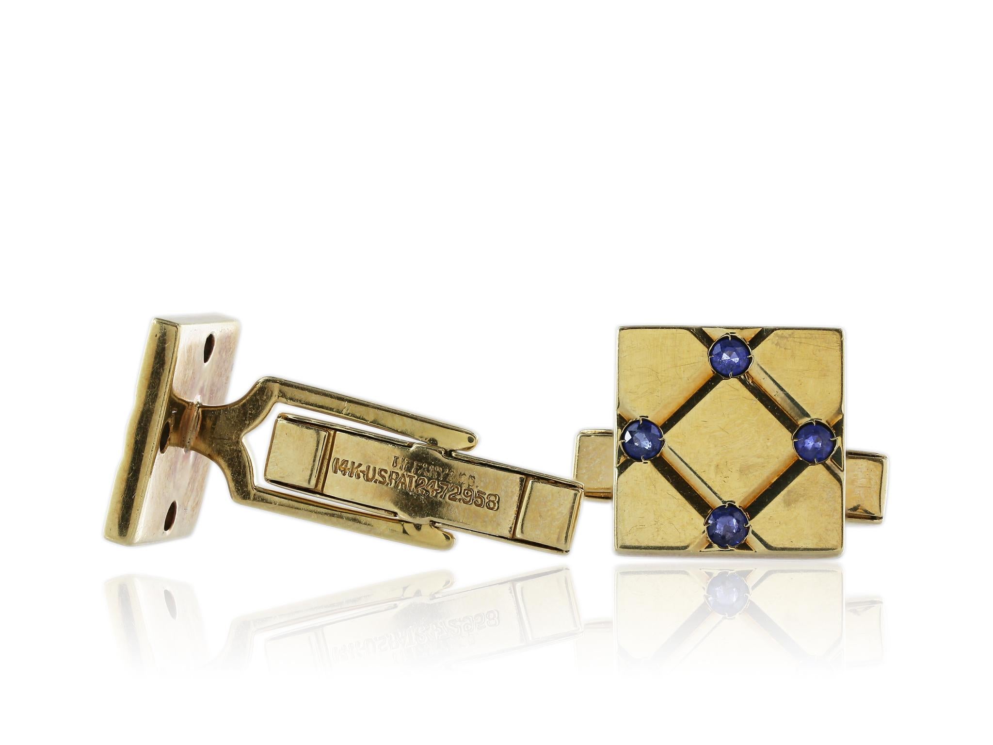 14 karat yellow gold square retro style sapphire cuff links. Signed Tiffany & Co.