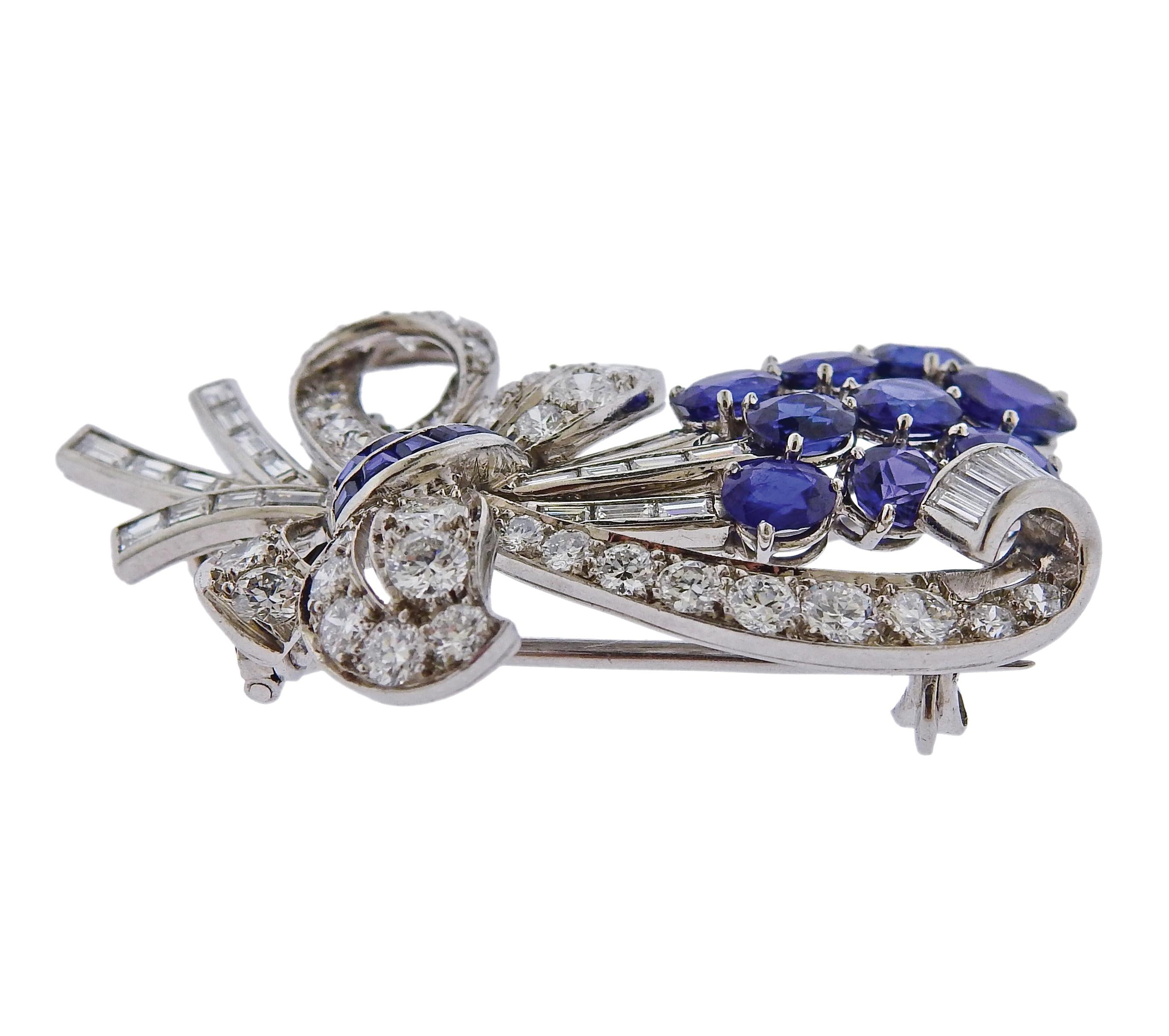 Platinum mid century Tiffany & Co brooch, set with approx. 3.50ctw in blue sapphires and approx.  3.25ctw in diamonds.  Brooch measures 43mm x 29mm. Marked Tiffany & Co Irid. Plat. Weighs 16.9 grams.

SKU#PB-03026