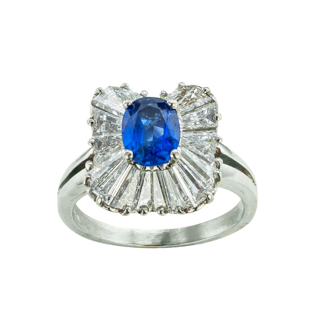 Tiffany & Co sapphire diamond and platinum ballerina style ring circa 1970. *

ABOUT THIS ITEM:  #R-DJ725C. Scroll down for detailed specifications.  This Tiffany & Co. ballerina ring features a lustrous blue sapphire framed by long tapering