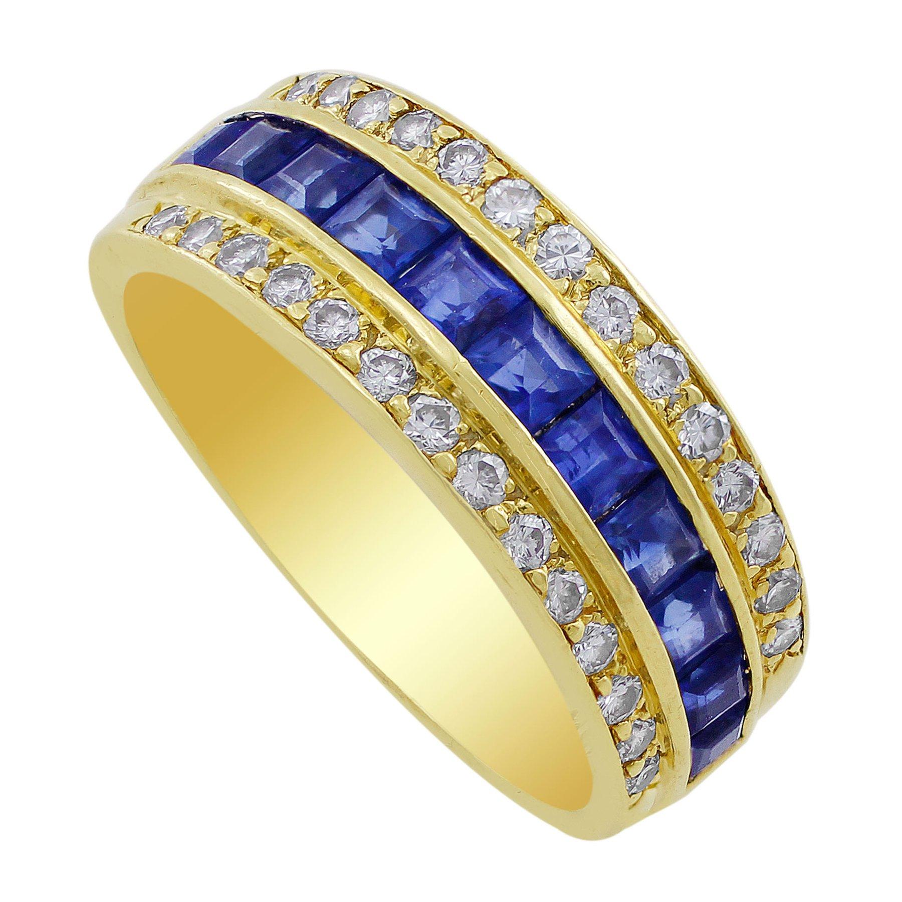 Tiffany & Co. Sapphire Diamond Ring. An 18k yellow gold Tiffany & Co. ring set with 11 princess cut sapphires and 28 round diamonds. The total sapphire weight is approximately 0.44cts and the total diamond weight is approximately 0.28cttw. The ring