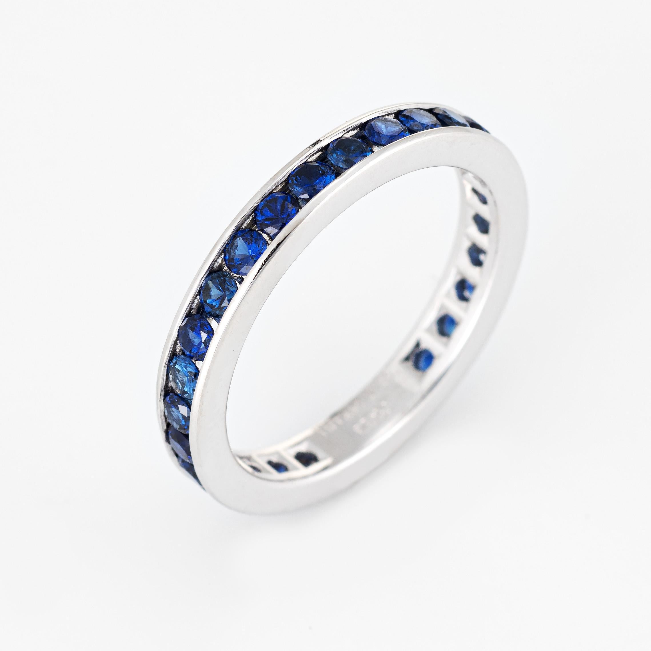 Pre owned Tiffany & Co sapphire eternity band crafted in 950 platinum.  

22 round cut blue sapphires are estimated at 0.05 carats each. The total sapphire weight is estimated at 1.10 carats. The sapphires are in excellent condition and free of