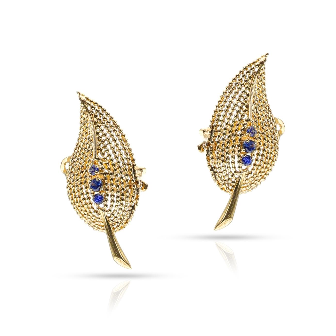 A set of 14k yellow gold Tiffany & Co. Sapphire Leaf Earrings make the perfect addition of elegance and luxury to any ensemble. The total weight of the earring is 7.29 grams. 