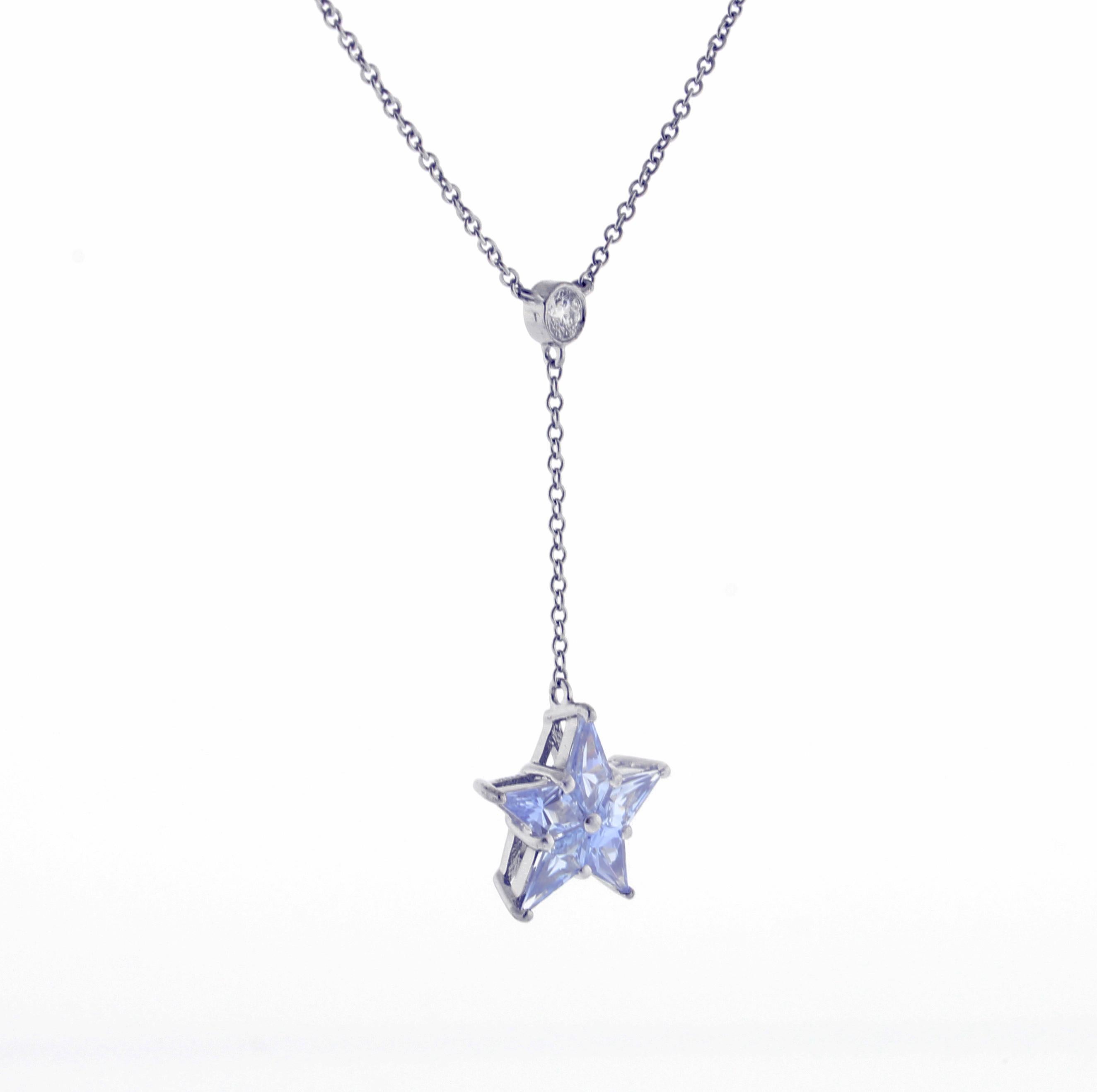 From Tiffany  & Co., thier sapphire and diamond start drop pendant necklace. The pendant is comprised of five kite shaped sapphires meticulously cut and set to from a star. 
♦ Designer: Tiffany & co.
♦ Metal: Platinum
♦ 5 sapphires=1.10 carats
♦