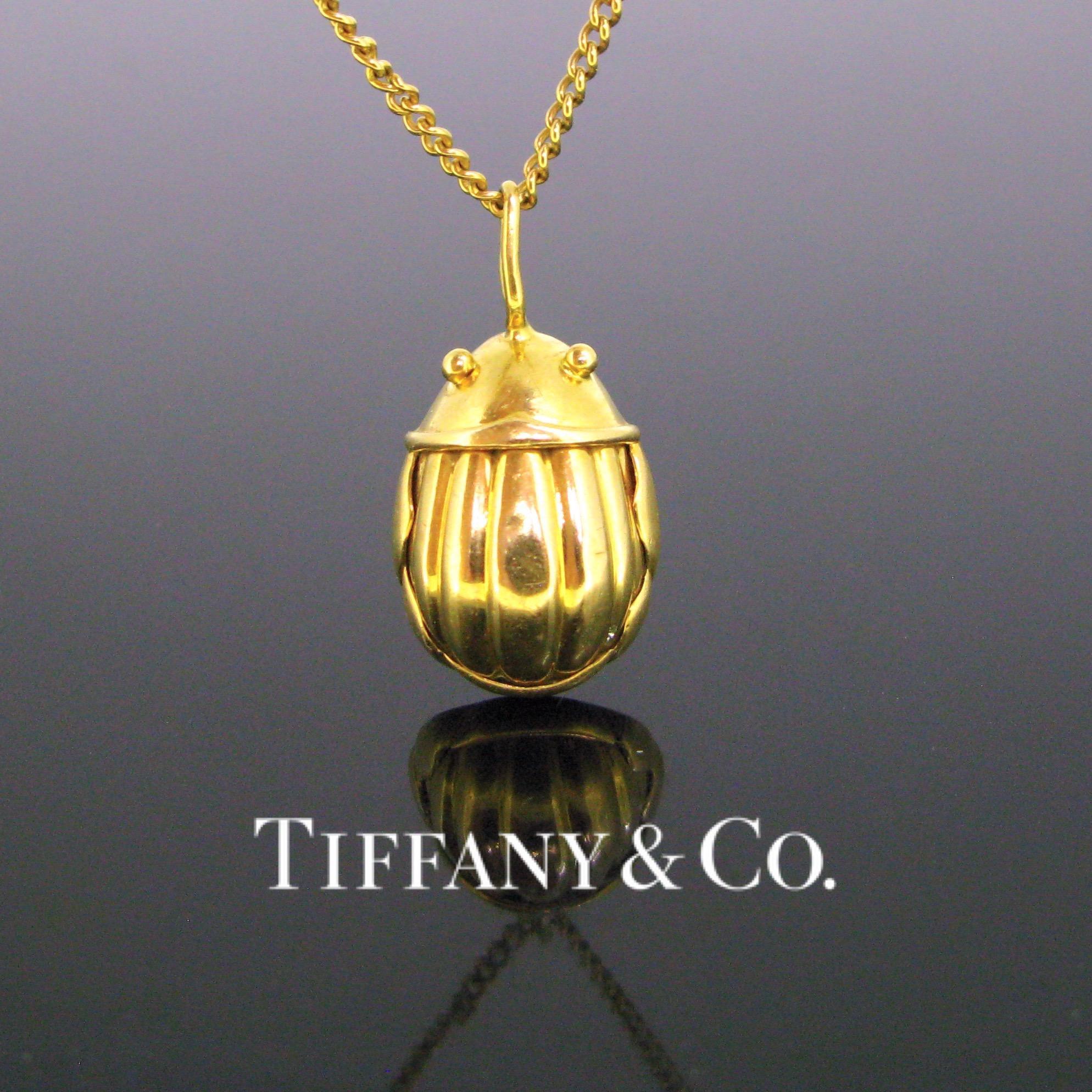 Weight:	6.98gr


Metal:	18k yellow gold 


Signature:	Tiffany&Co


Condition:	Very Good


Comments: 	This lovely pendant depicts the iconic Scarab charm pendant made by Tiffany & Co in 1993. It is in 18k hollow yellow gold. The charm is signed and
