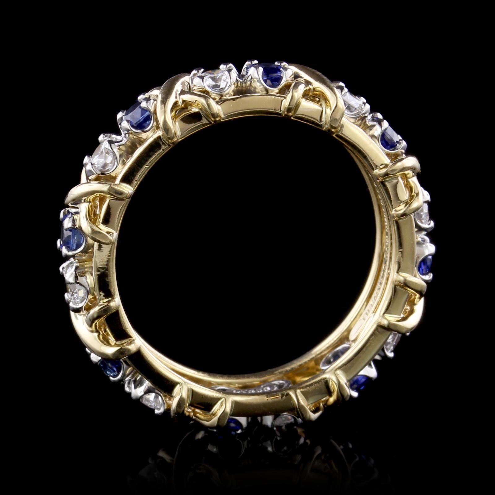 Tiffany & Co. Schlumbereger 18K Yellow Gold and Platinum Sixteen Stone Sapphire and Diamond Ring. The ring is set with eight round cut sapphires weighing .80cttw., and eight full cut diamonds weighing .59cts., FG color, VS carity, size 8.