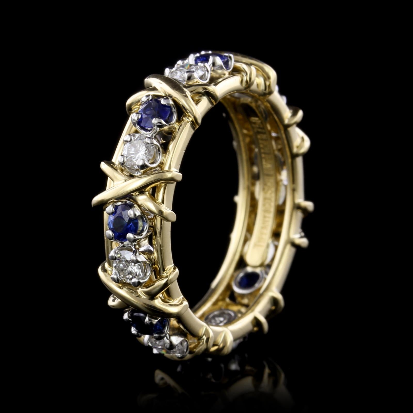 Round Cut Tiffany & Co. Schlumbereger 18K Yellow Gold and Platinum Sapphire & Diamond Ring