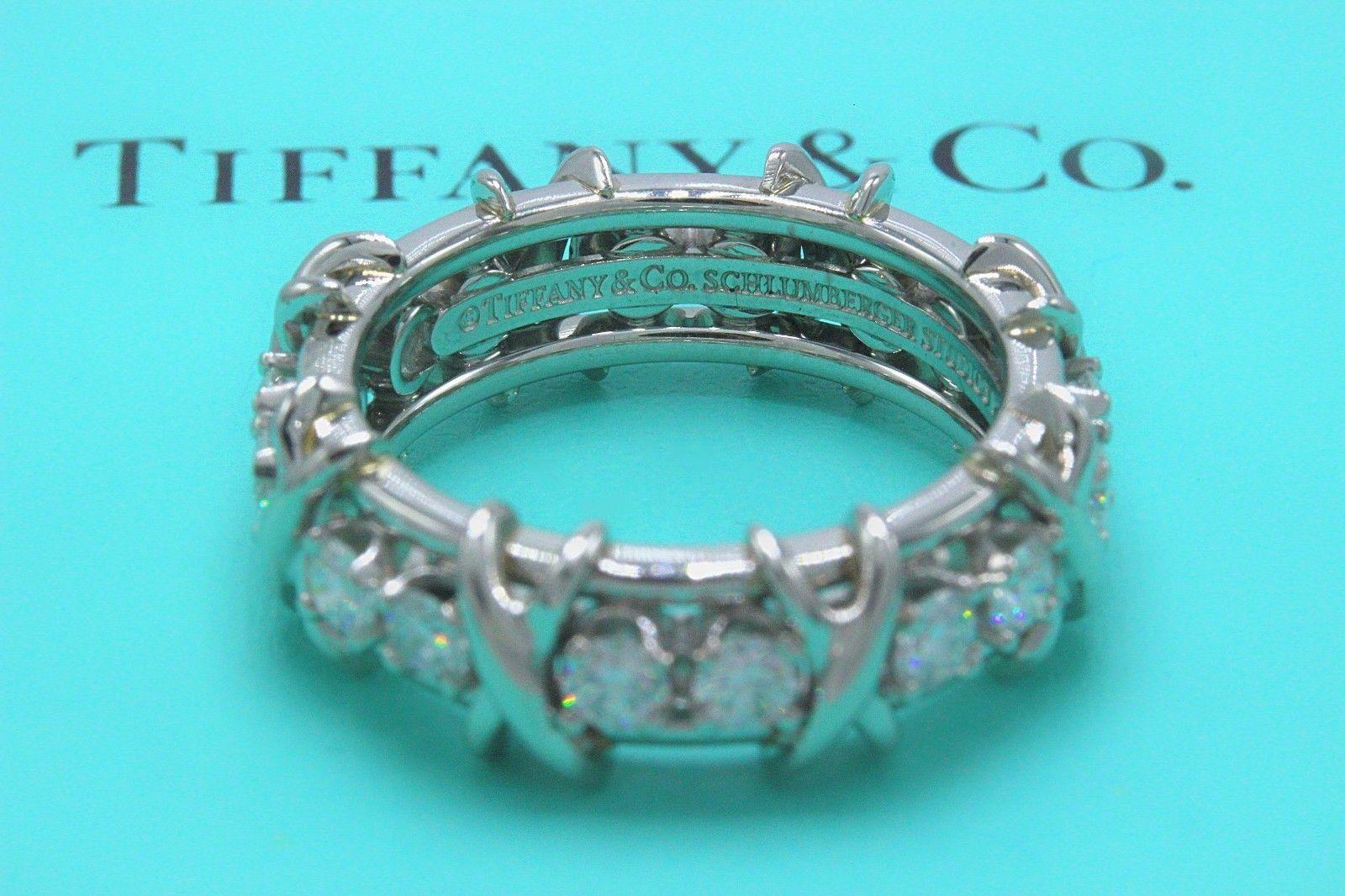 Tiffany & Co.

Style:  Schlumberger Sixteen Stone Ring
Metal:  Platinum PT 950
Size:  7
Total Carat Weight:  1.14 TCW
Diamond Shape:  Round Brilliant Diamonds
Diamond Color & Clarity:  F / VVS
Hallmark:  ©TIFFANY&Co. SCLUMBERGER STUDIOS PT950