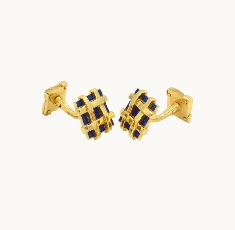 Jean Schlumberger for Tiffany & Co. vintage 18 karat yellow gold cufflinks from circa 1980s.  These cufflinks feature dark blue enamel with a basket-weave design.  Signed 