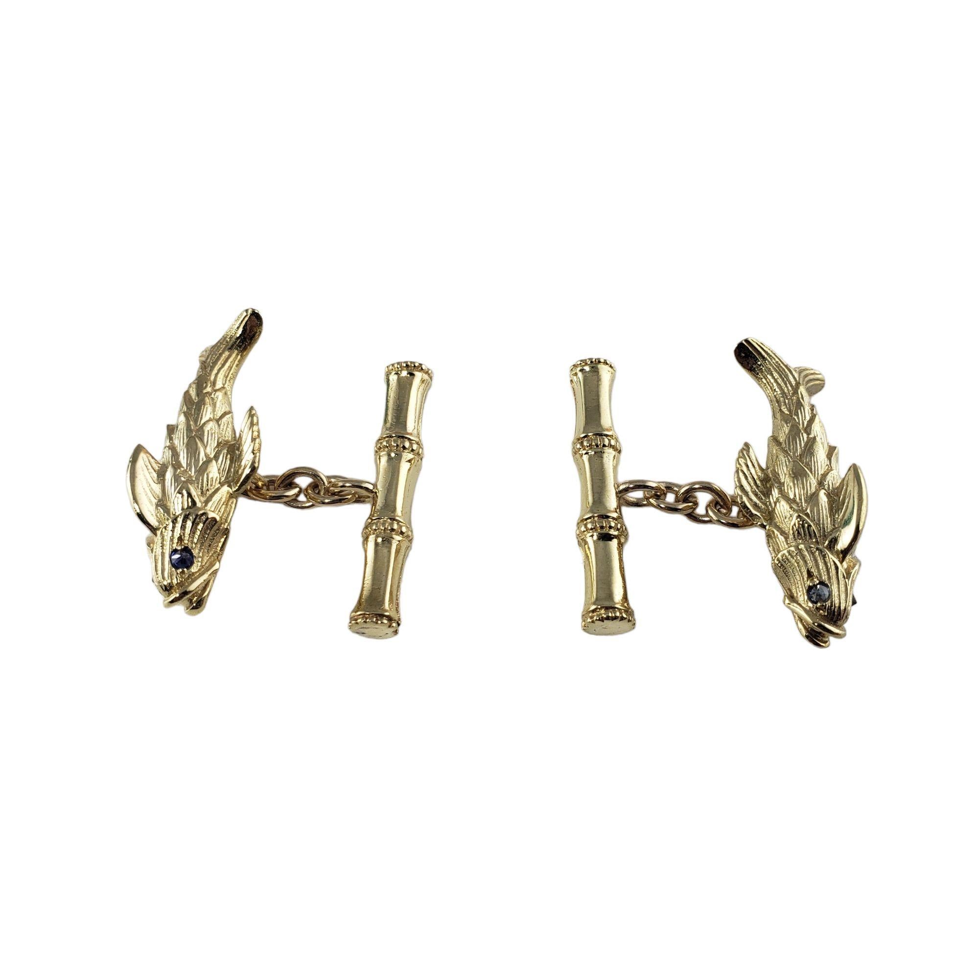 Vintage Tiffany & Co. Schlumberger 18 Karat Yellow Gold and Sapphire Koi Fish Cufflinks-

These elegant koi fish are beautifully detailed in 18K yellow gold by Schlumberger for Tiffany & Co. Each feature two blue sapphire eyes.

Size: 27 mm x 12