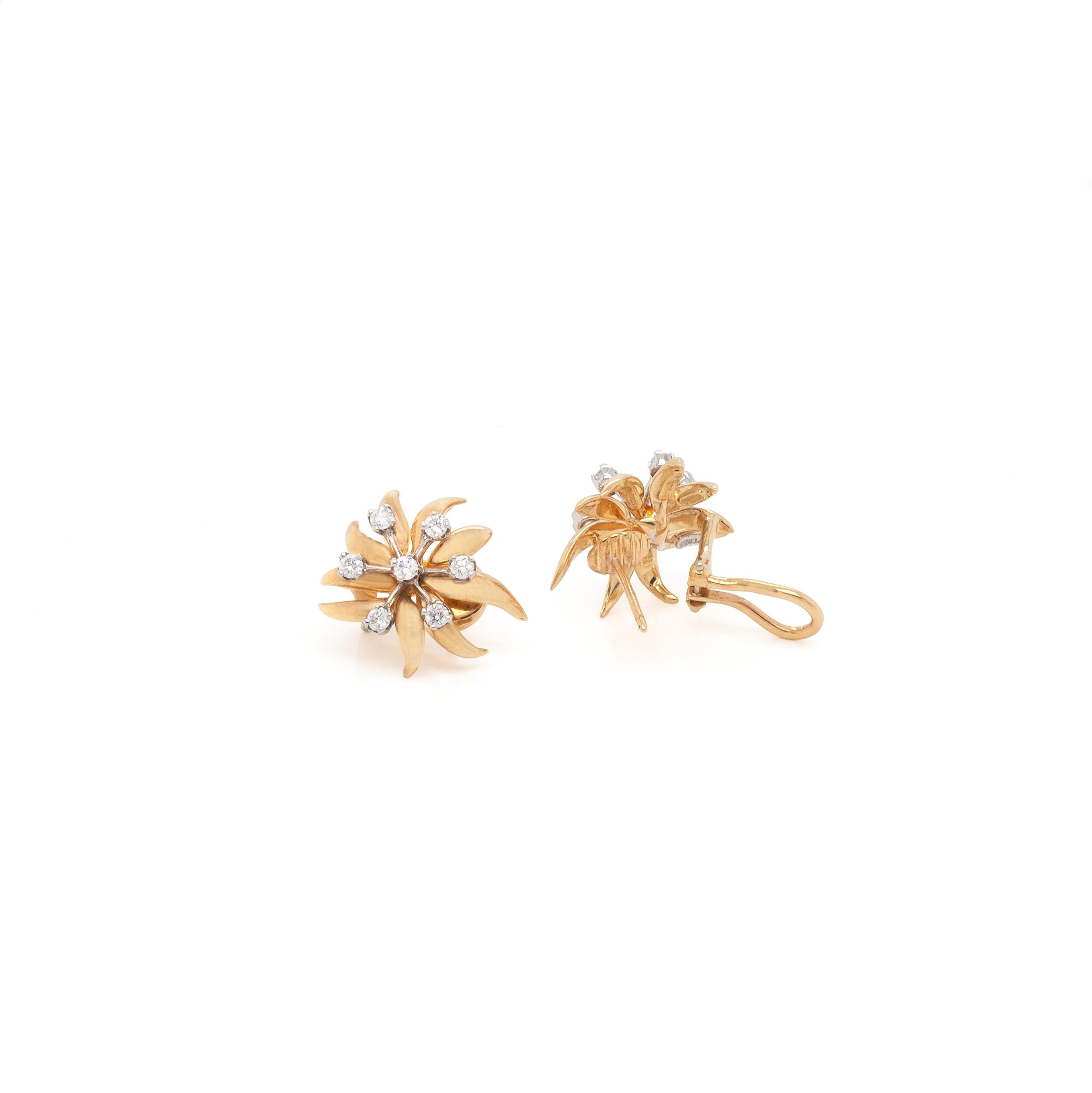 These striking Flame earrings designed by Jean Schlumberger for Tiffany & Co. are simply divine.

The flame motif is crafted out of 18ct yellow gold, and overlayed with a platinum spray design from which seven round brilliant cut diamonds are claw