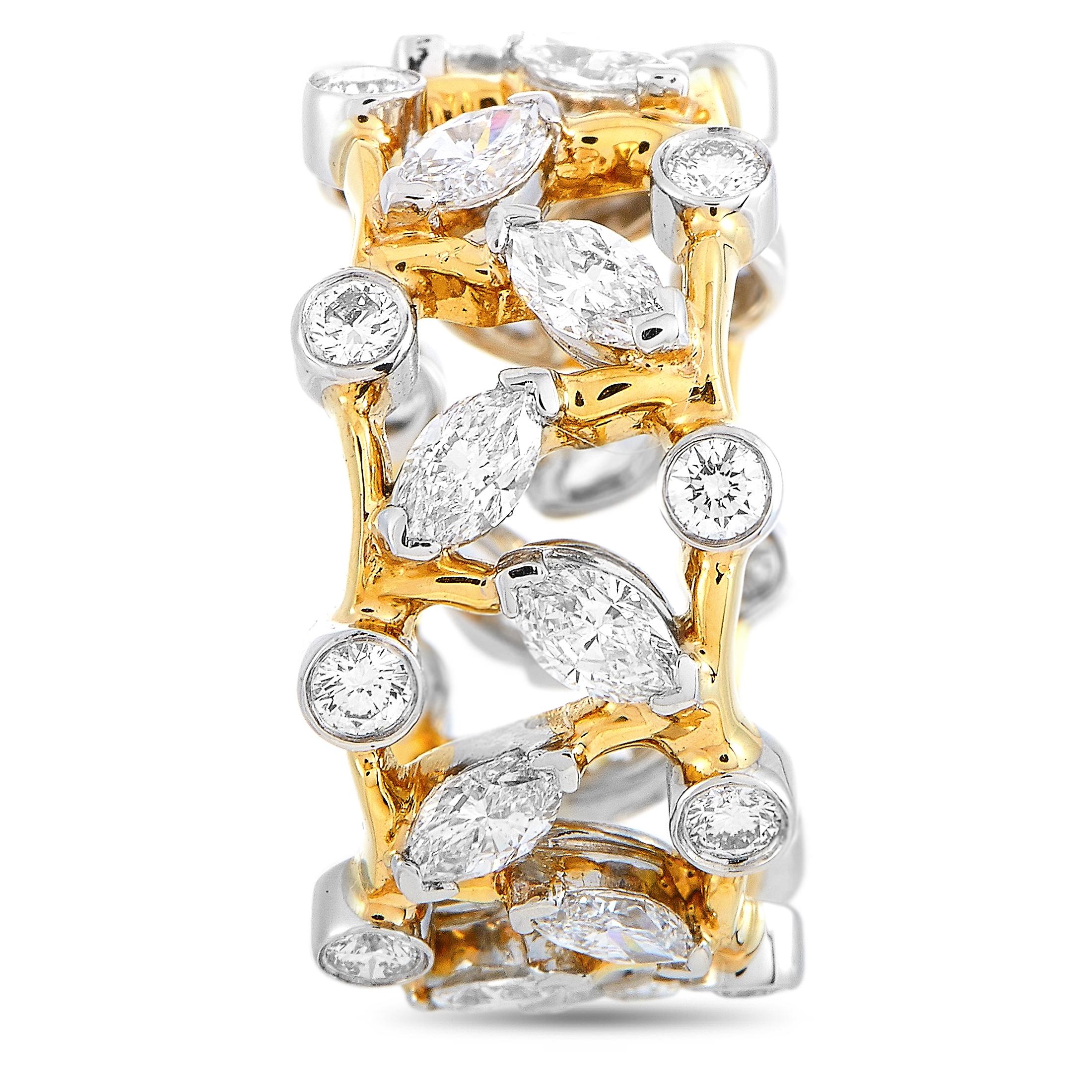 This Tiffany & Co. Schlumberger ring is made out of 18K yellow gold and platinum and weighs 10 grams, boasting band thickness of 10 mm. The ring is set with round and marquise diamonds that feature grade F color and VS1 clarity and total