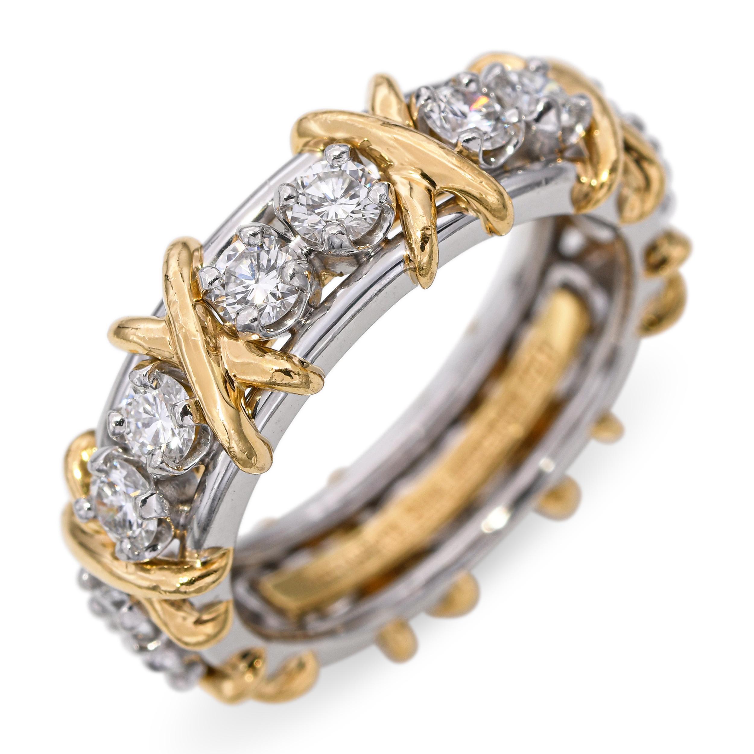 Cette pièce de Tiffany & Co. La bague Brilliante présente seize diamants brillants sertis dans un luxueux modèle en or jaune 18 carats et en platine. La combinaison de l'or chaud et du platine froid crée un contraste saisissant qui rehausse l'éclat