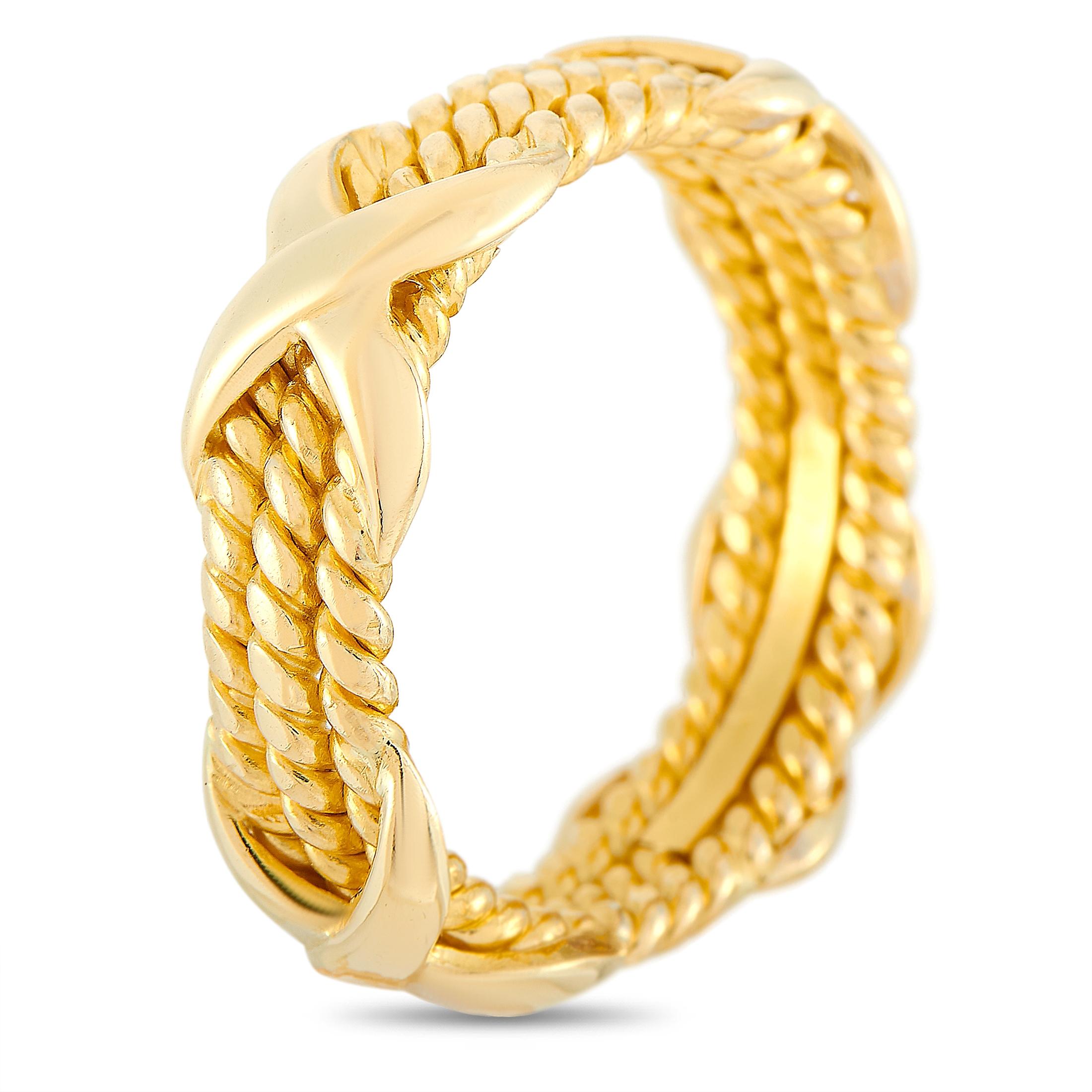 The Tiffany & Co. Schlumberger ring is crafted from 18K yellow gold and weighs 7.3 grams, boasting band thickness of 6 mm.

This item is offered in estate condition and includes the manufacturer’s box.
Ring Size: 7.0