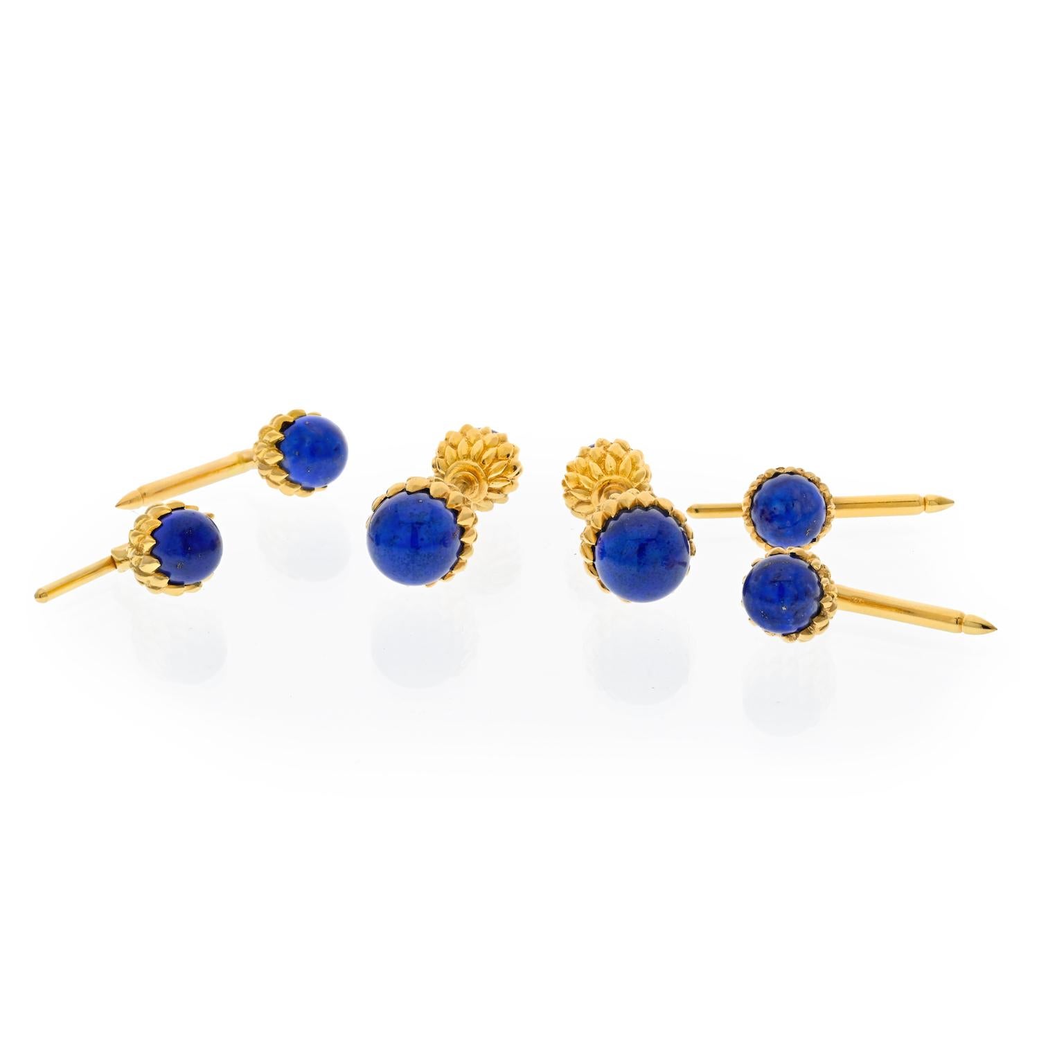 Comprised of a pair of cufflinks and four shirt studs; crafted in 18K gold; featuring lapis lazuli cabochons; cufflink fronts measure 7/16 inch and backs measure 3/8 inch, studs measure 3/8 inch; weight 30.30 g.
Signed: SCHLUMBERGER 