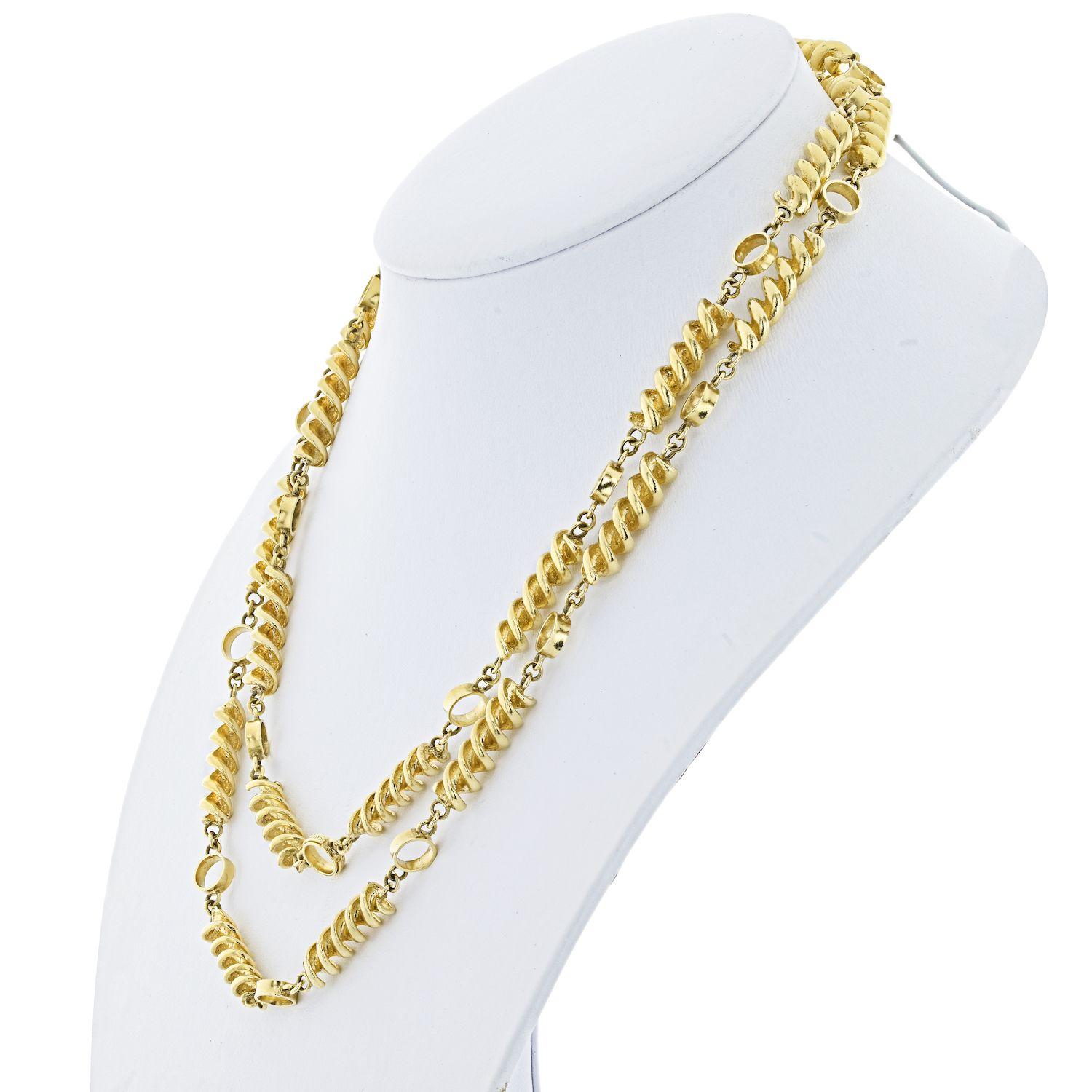 Achieve an instantly polished look with this vintage yellow gold chain! Tiffany & Co. chain by Schlumberger is composed as a stylized 38 inch long chic accessory. 