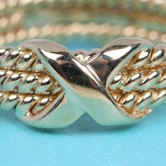 Tiffany & Co. Bague Schlumberger à trois rangées, modèle « Rope X Band », en or jaune 18 carats