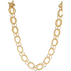 gold rope chain with circle pendant Tiffany
Co. Schlumberger 18 Karat Yellow Gold Circle Rope Chain Necklace