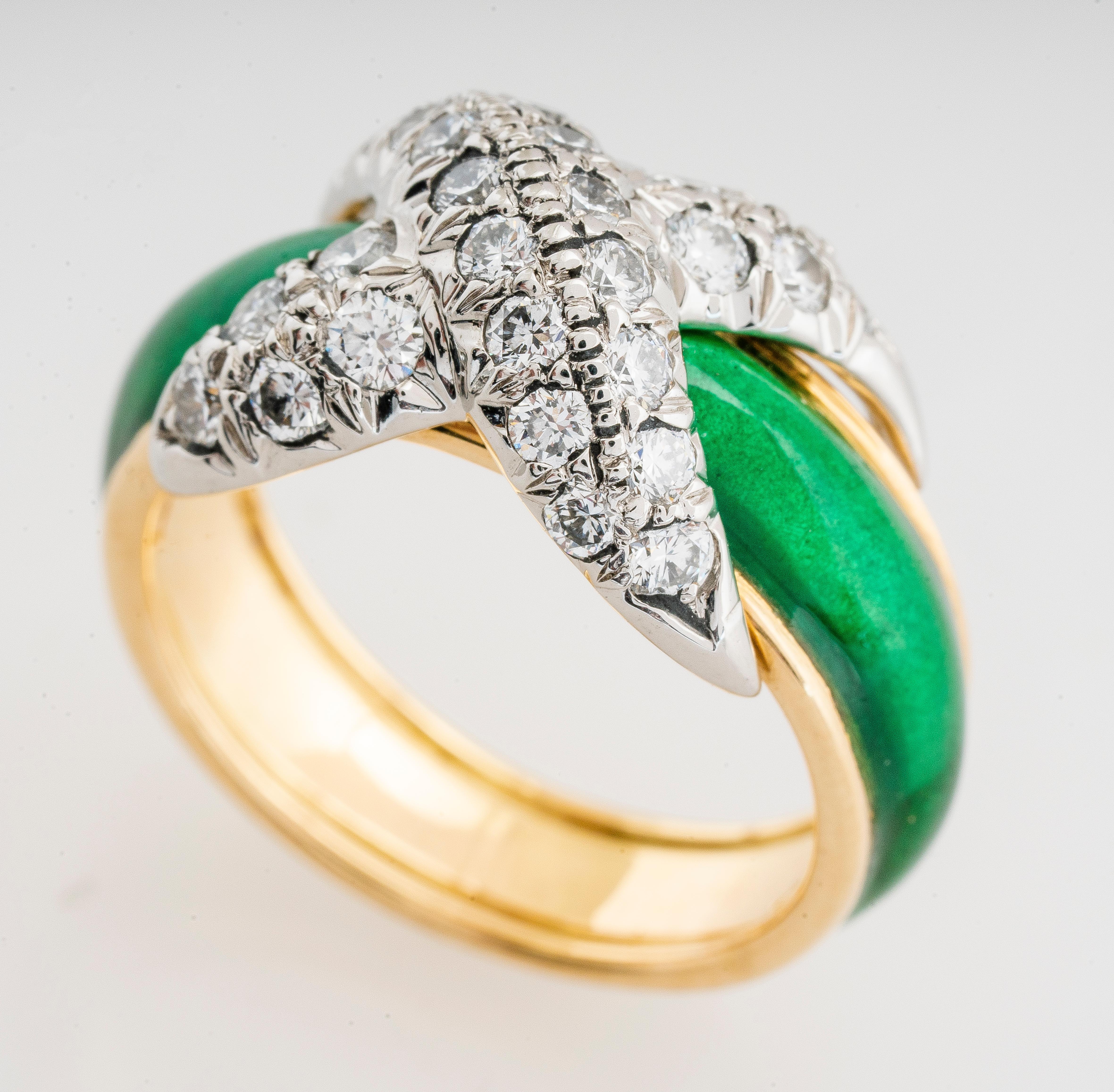 Vintage Tiffany & Co 18ky and platinum diamond and green enamel x-style ring designed by Jean Schlumberger.  Diamonds are 0.85 carat total weight G-H color and VS2 clarity.  Green enameling is vivid and in great condition. 
Ring is a size 5.25 and