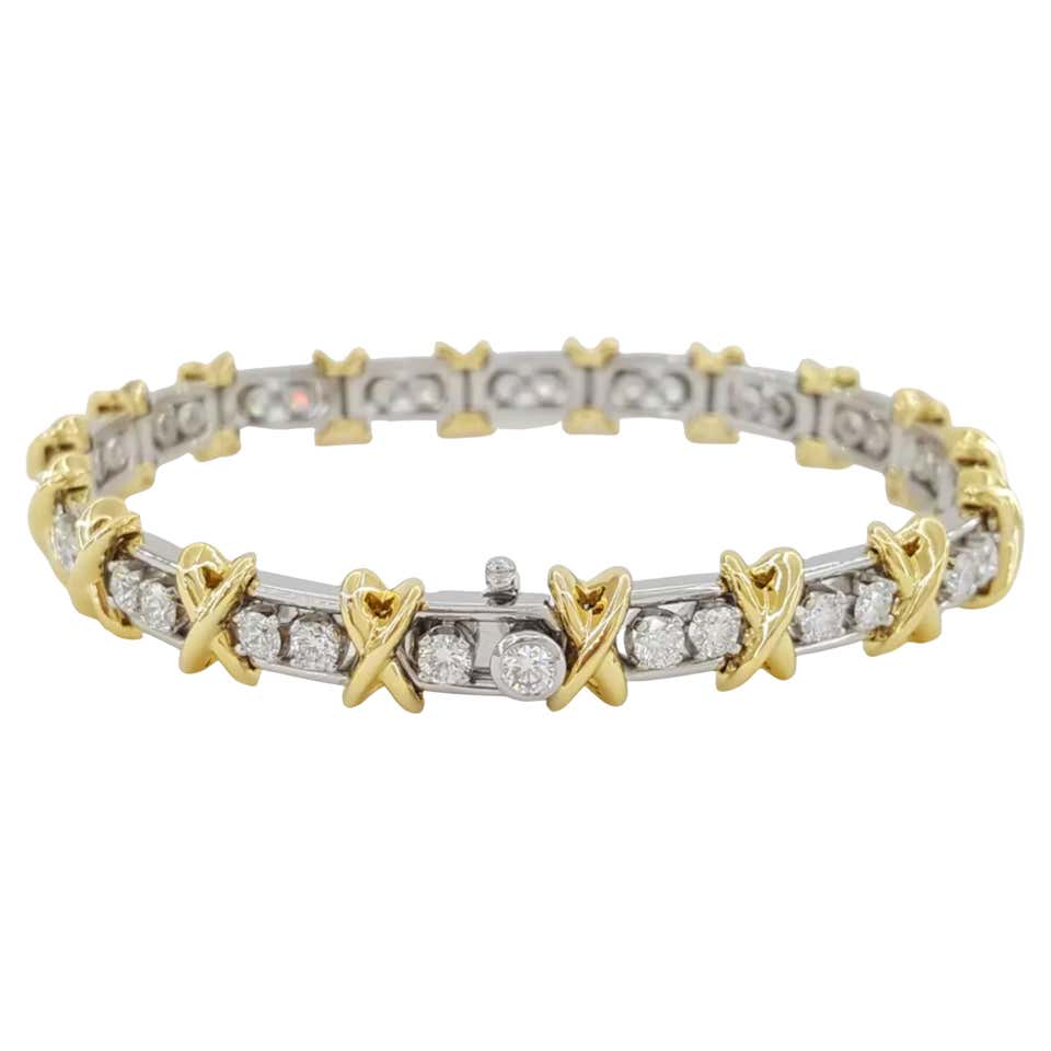 Tiffany and Co. Ruby, Diamond, Platinum and 18 Karat Gold Victoria ...