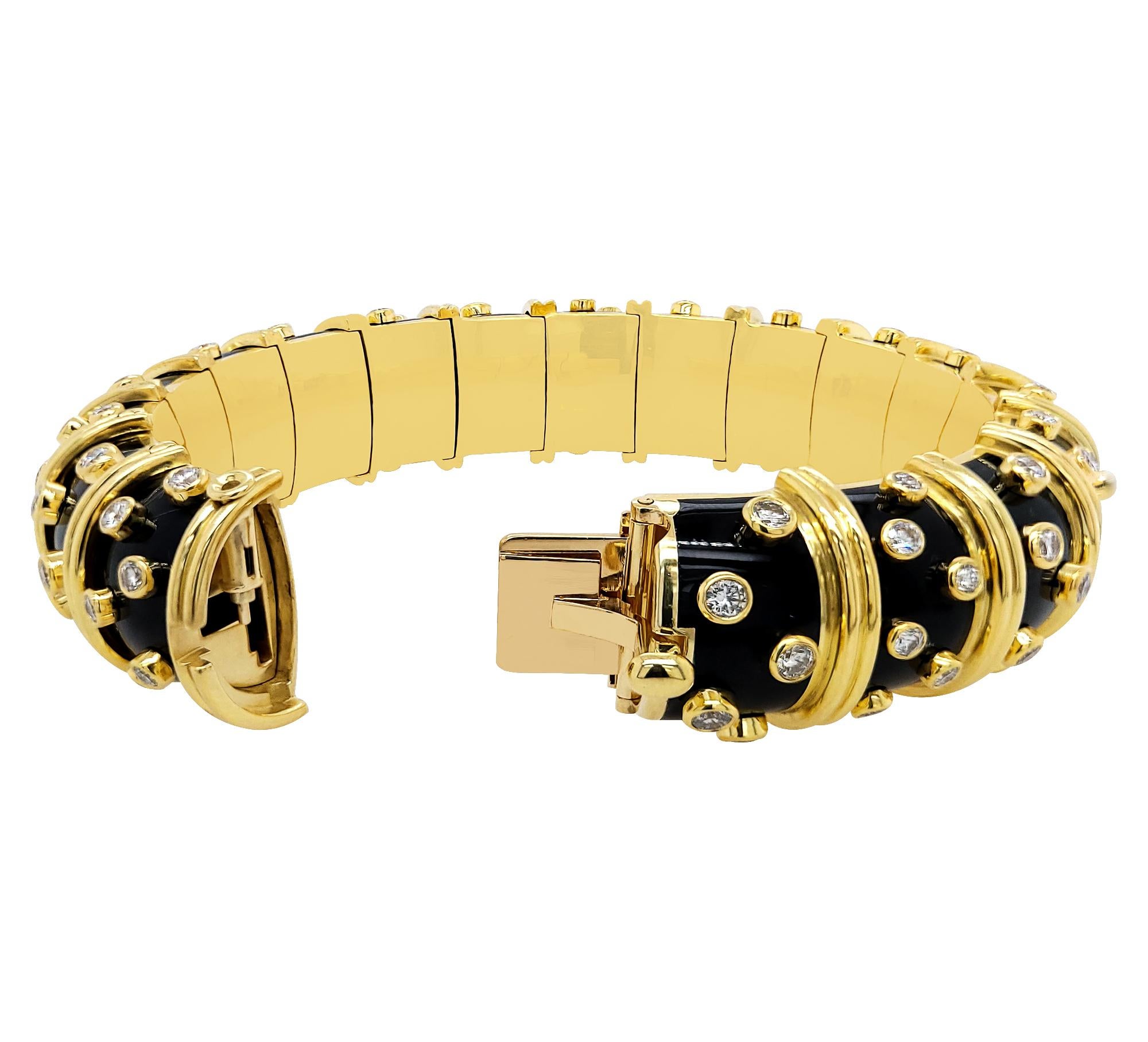 A stunning wide bracelet from Tiffany & Co. Schlumberger collection.
It's decorated with round diamonds, black enamel and set in 18k yellow gold.
Weight of the bracelet is 119.78 grams.

Signed Tiffany & Co. Schlumberger 
750 France

Diameter is