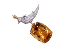 Tiffany & Co. Spilla Schlumberger in oro 18 carati e platino con uccello citrino su roccia e diamante