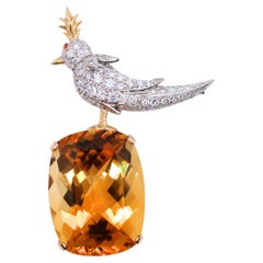Tiffany & Co. Spilla Schlumberger in oro 18 carati e platino con uccello citrino su roccia e diamante