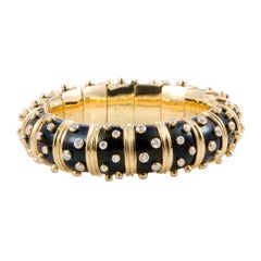 Tiffany & Co. Schlumberger Diamond and Onyx Yellow Gold Bombe Bangle Bracelet