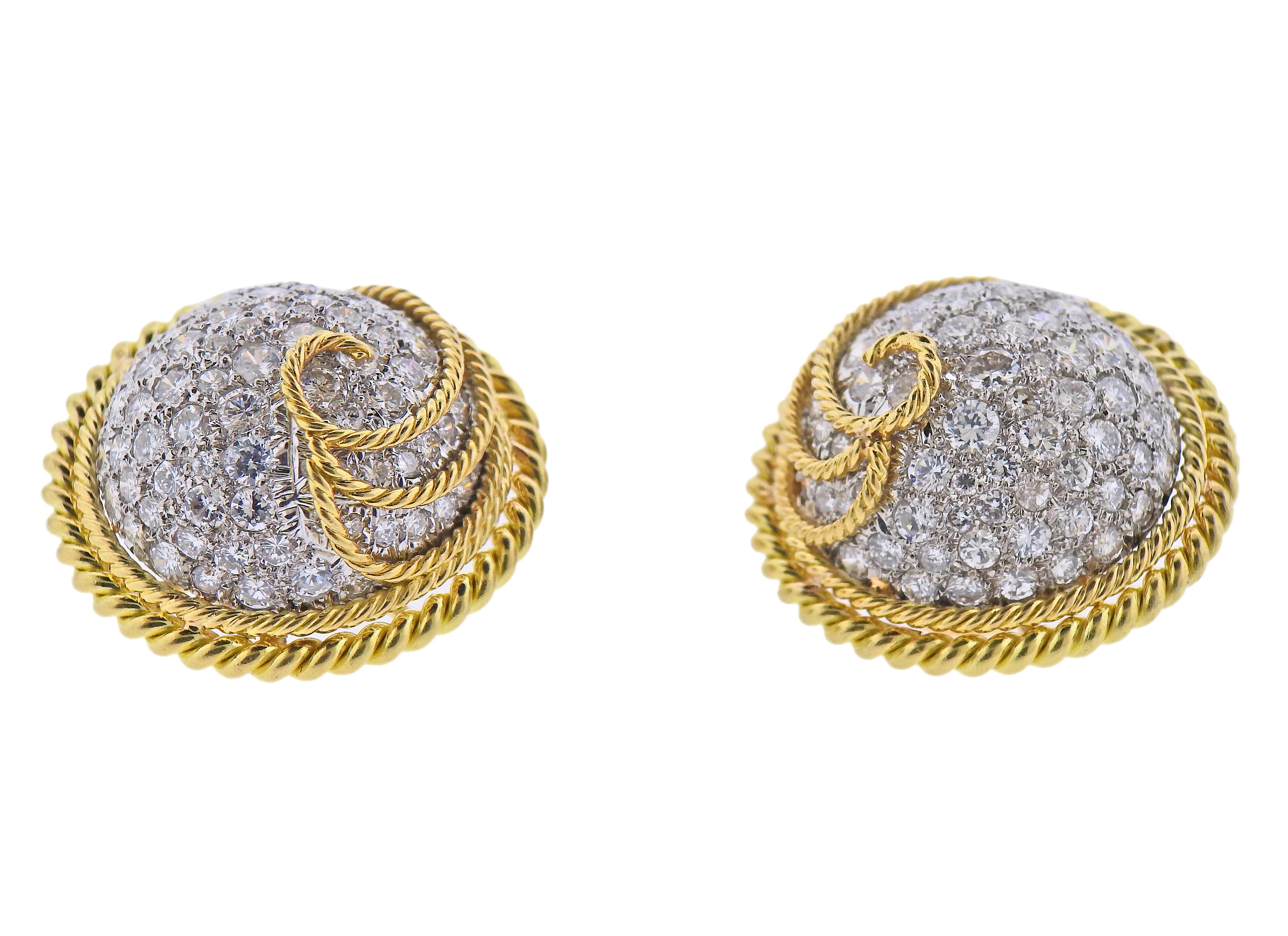 Pair of 18k gold and platinum earrings by Jean Schlumberger for Tiffany & Co, set with approx. 6.00-6.50ctw in diamonds. Earrings are 26mm in diameter. Marked: 750, Tiffany & Co, Schlumbeger. Weight - 36 grams. 
