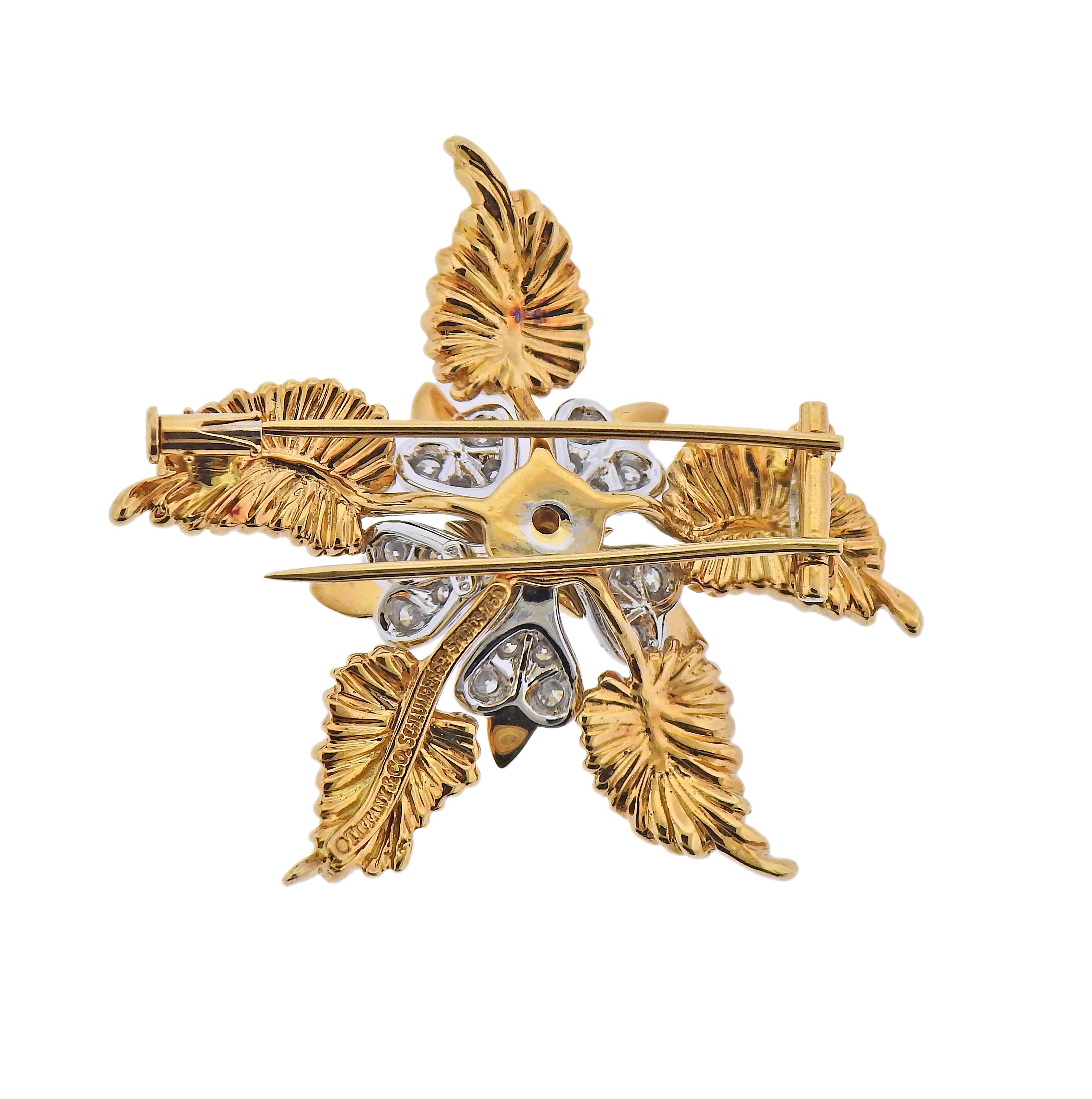 18k gold and platinum brooch, by Jean Schlumberger for Tiffany & Co, adorned with approx. 1.20ctw in diamonds. Brooch is 44mm x 45mm. Marked: Tiffany & Co, Schlumberger, 750, pt950. Weight - 25.2 grams.