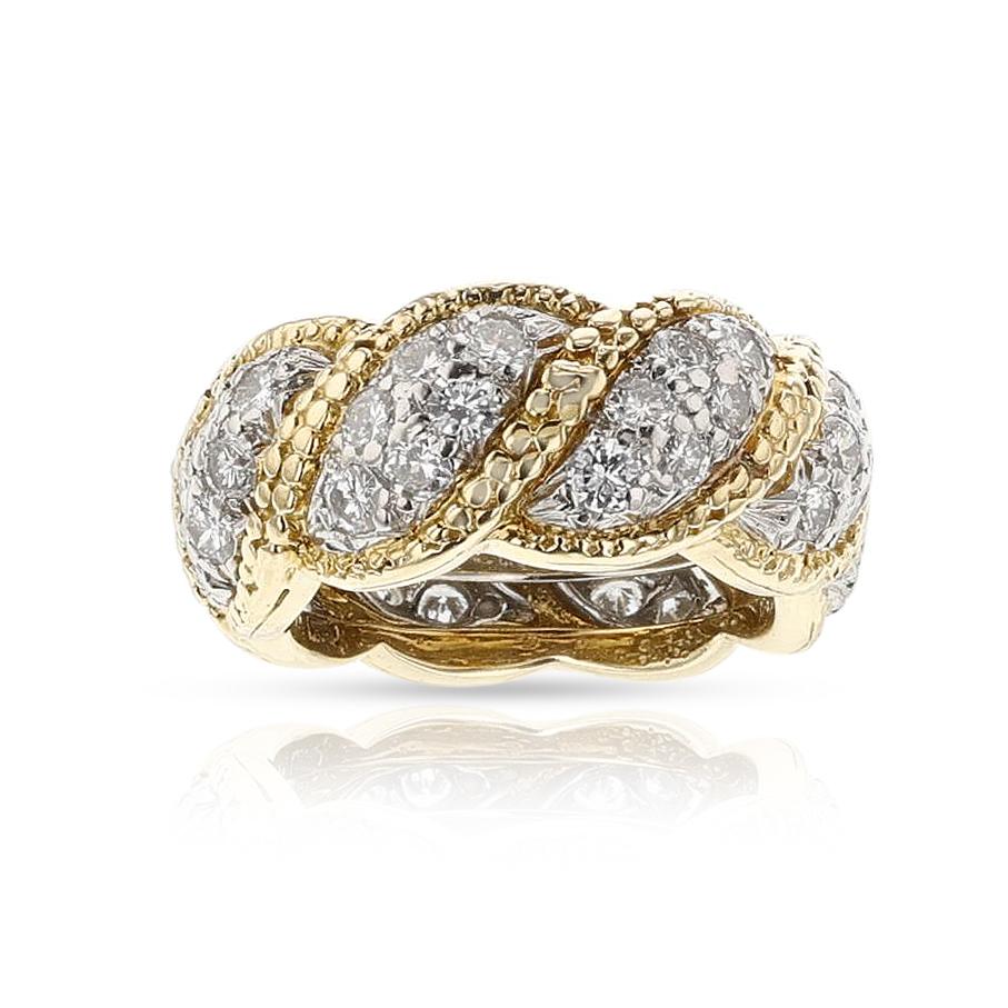 A Tiffany & Co. Schlumberger Diamond Wedding Band,18k and Platinum. The ring size is size US 6. The weight of the ring is 15.35 grams.
