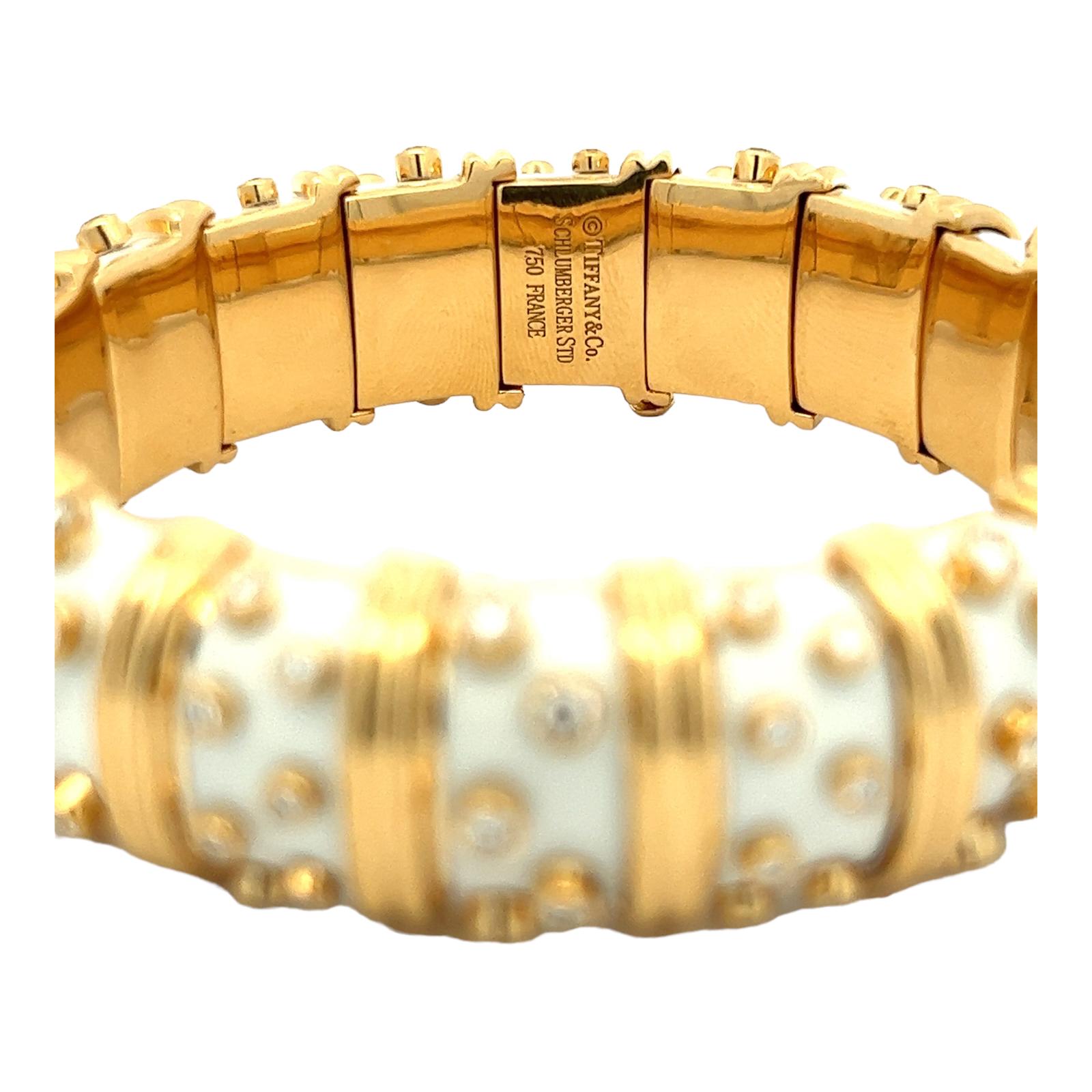 Modern Tiffany & Co. Schlumberger Diamond White Enamel 18KYG Hinged Bangle Bracelet