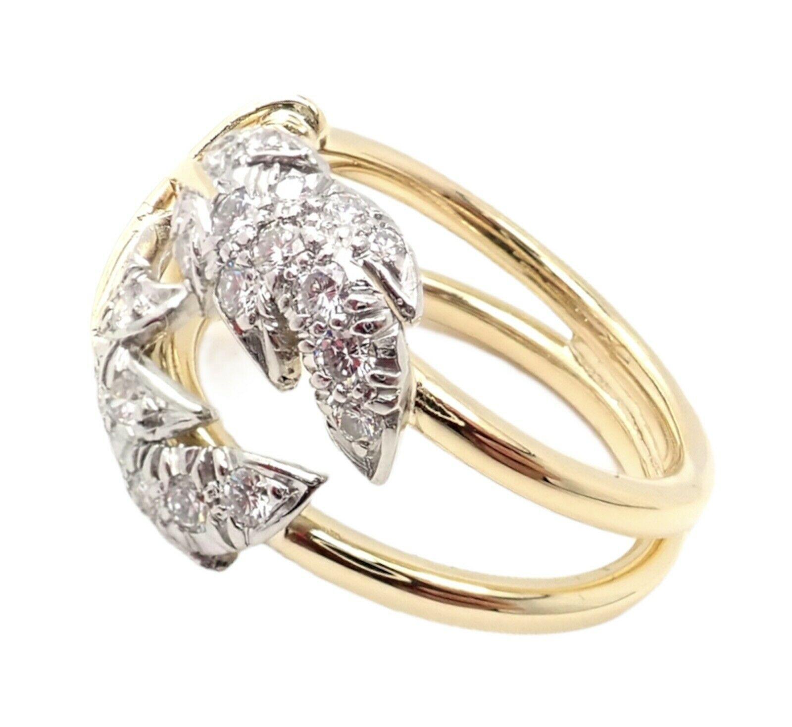 Platinum & 18k Yellow Gold Diamond Two Leaves Ring by Jean Schlumberger for Tiffany & Co. 
With 26 round brilliant cut diamonds VS1 clarity, G color total weight approx. .54ct
Details: 
Size: 6.25
Weight: 8.2 grams
Width: 15mm
Stamped Hallmarks: