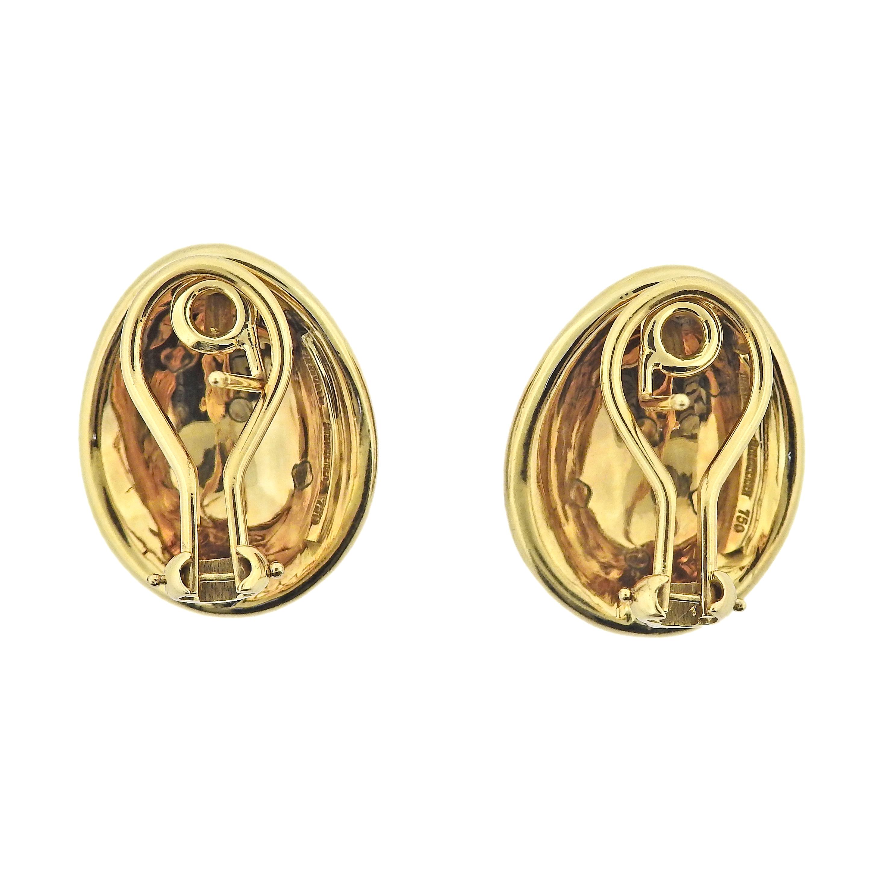 Pair of Tiffany & Co Schlumberger red enamel earrings in 18k gold.  Earrings are 23mm x 18mm. Weight - 20.1 grams. Marked: Schlumberger, Tiffany & Co, 750.