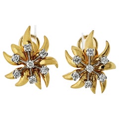 Tiffany & Co. Orecchini con diamanti a forma di fiamma in oro e platino