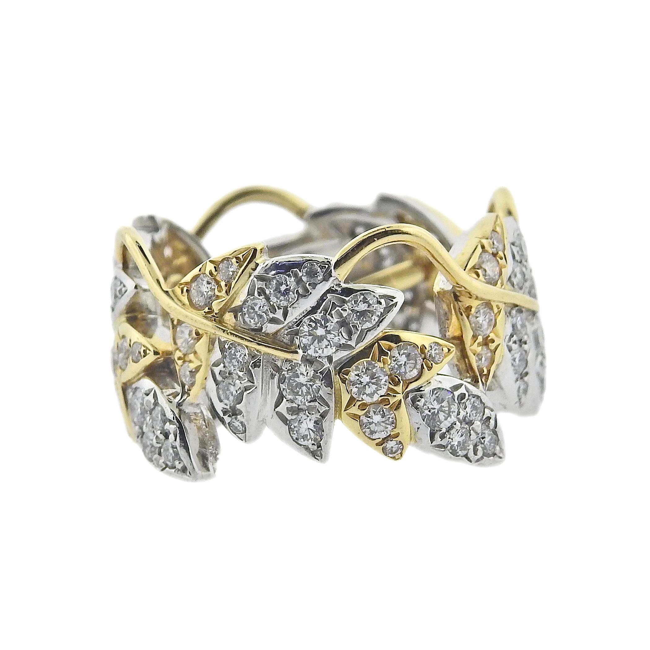 Platinum and 18k gold four leaves vine band ring by Jean Schlumberger for Tiffany & Co, with 1.60ctw G/VS diamonds.  Ring size 6, top is 16mm wide.  Weight - 13.7 grams. Marked: Tiffany & Co, 750, Schlumberger, pt950.