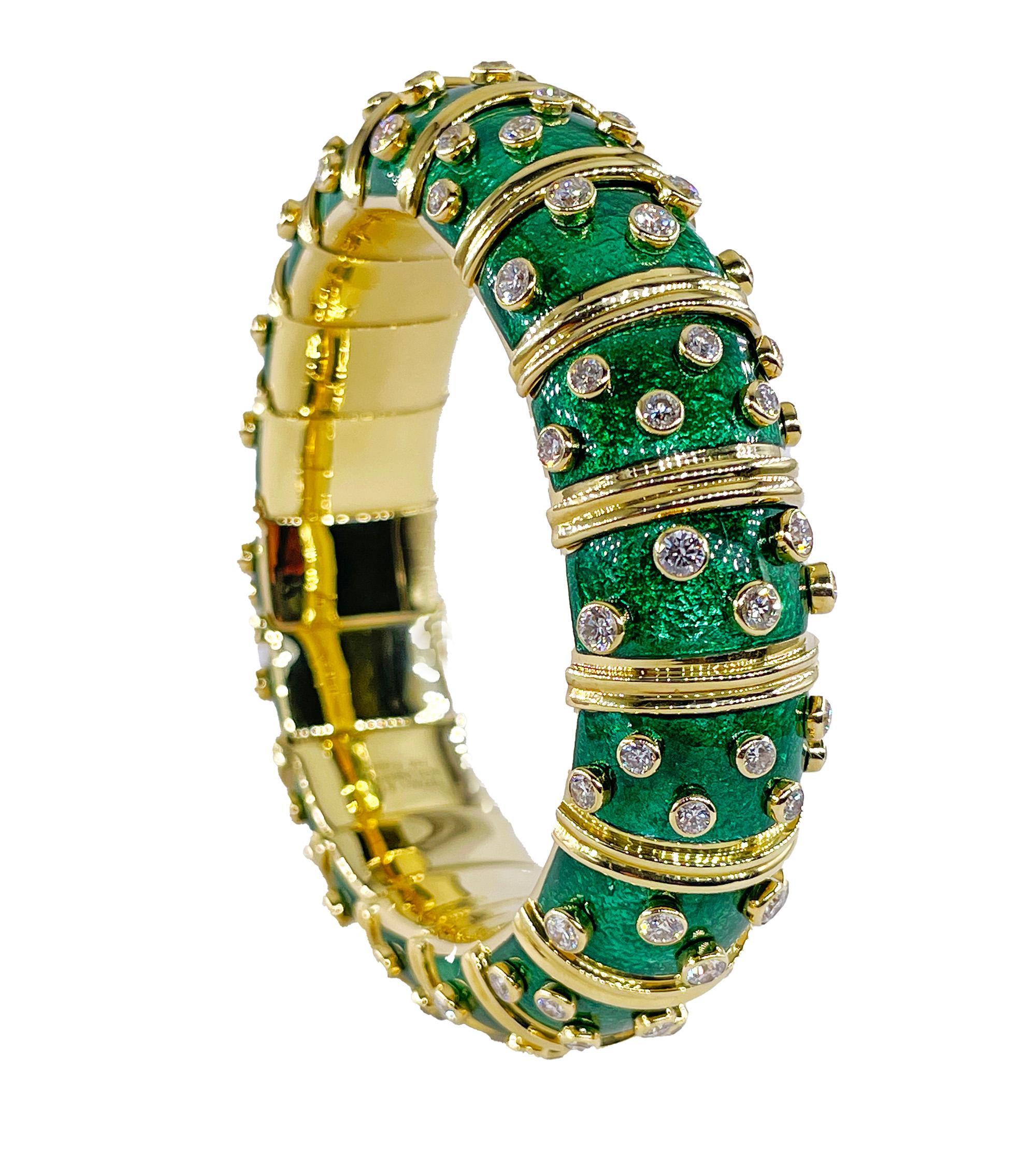 DIAMOND DOTS GREEN ENAMEL 18K GOLD BANGLE BRACELET, BY JEAN SCHLUMBERGER, TIFFANY & CO. PARIS
A masterpiece of modern luxury, this Iconic Tiffany & Co. Schlumberger bracelet seamlessly blends classic elegance with contemporary flair. 
Designed as a