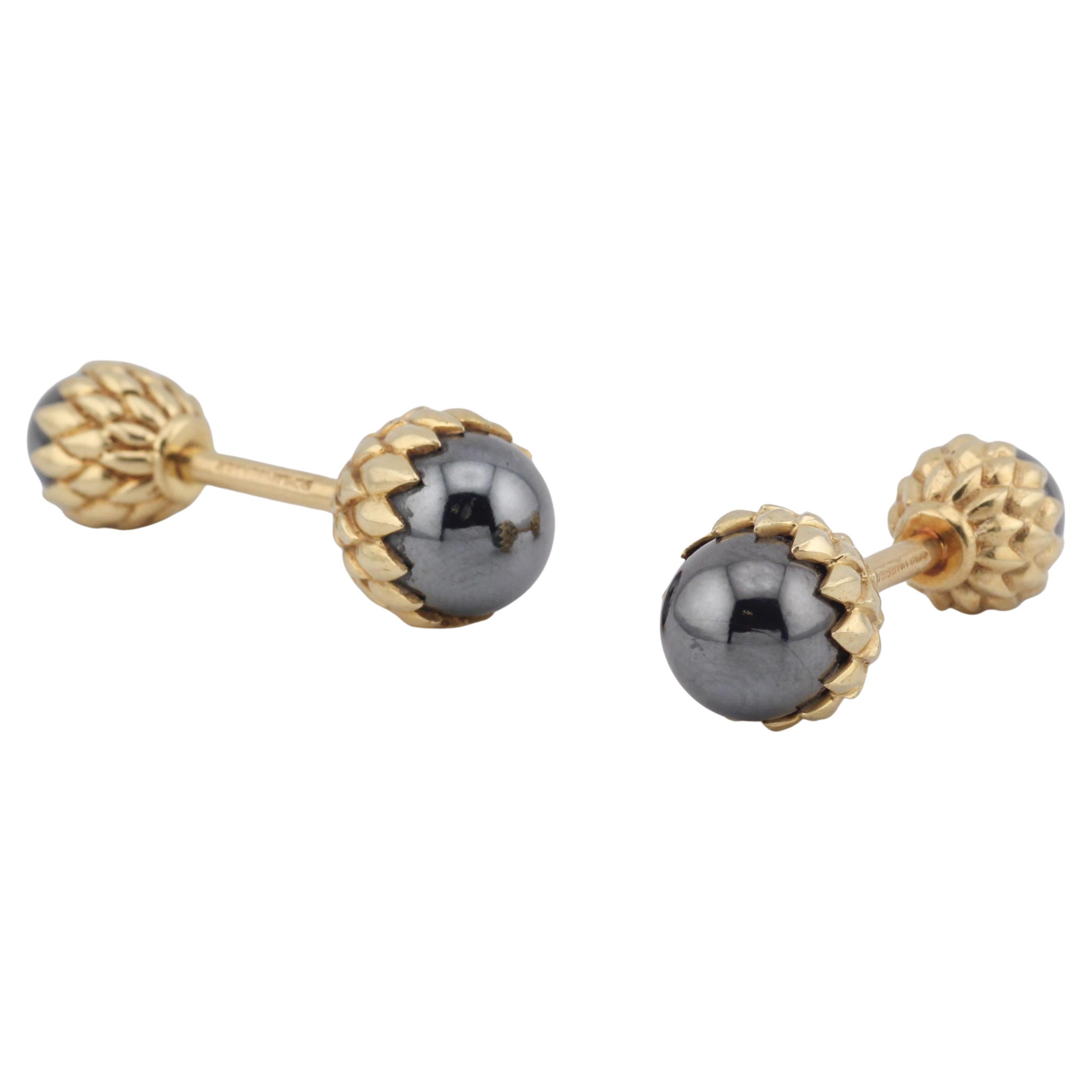 Tiffany
Co., Schlumberger Hematite 18K Yellow Gold Acorn Cufflinks Mismatched