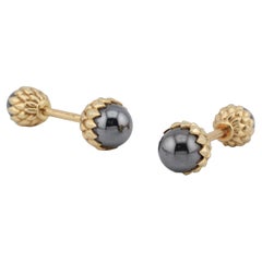 Tiffany & Co., Schlumberger Hematite 18K Yellow Gold Acorn Cufflinks Mismatched