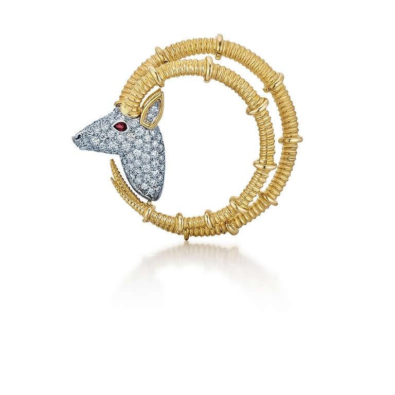 18 karat yellow gold and platinum diamond and ruby eye Ibex Ram head brooch by Tiffany & Co. Schlumberger.