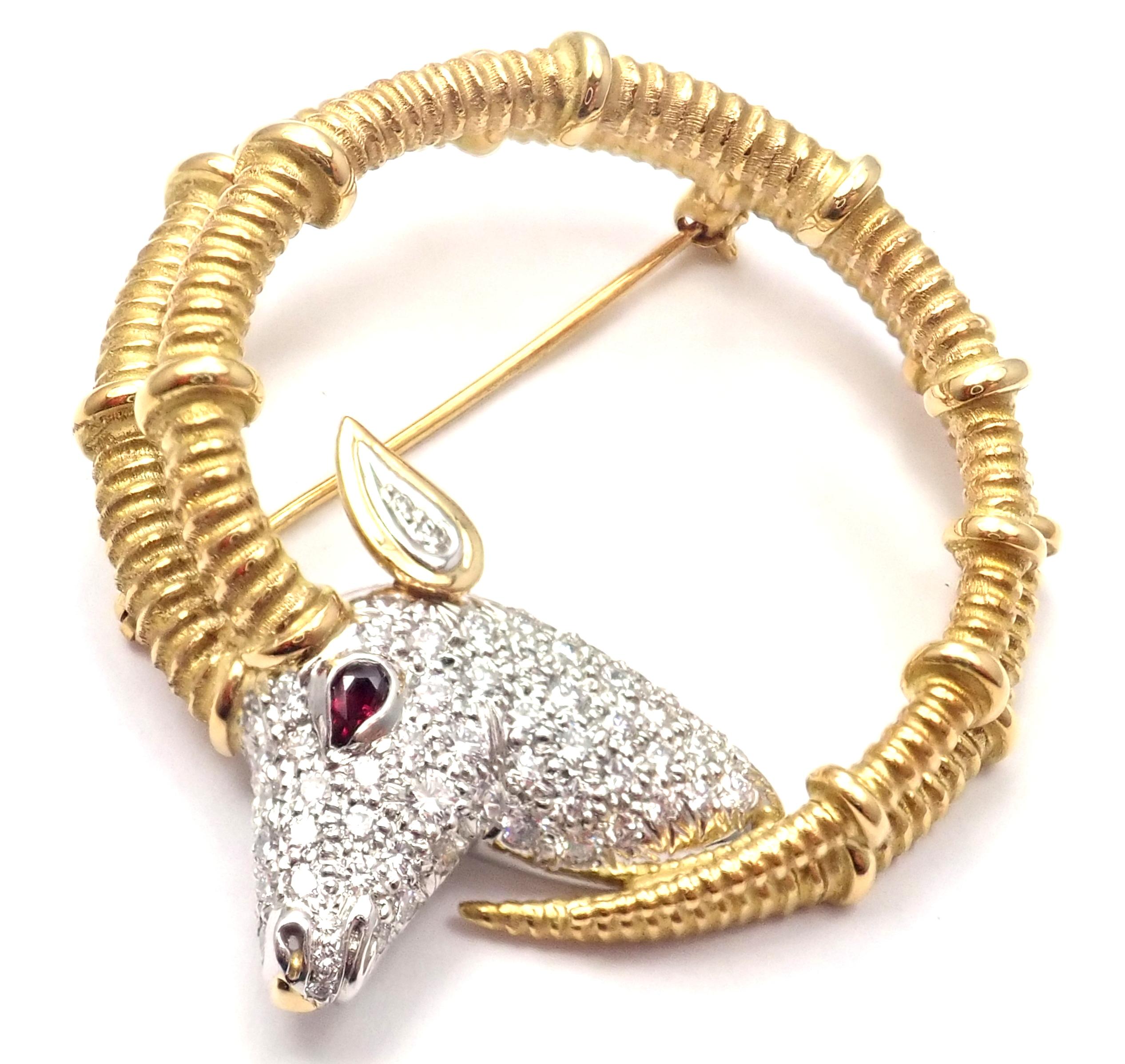 18k Yellow Gold and Platinum Diamond Ruby Ibex Pin Brooch by Jean Schlumberger for Tiffany & Co. 
With Round brilliant cut diamonds VVS1 clarity, E color 
total weight approx. 1.20ct  
1 ruby
Details:  
Weight: 21.4 grams 
Measurements: 1.63