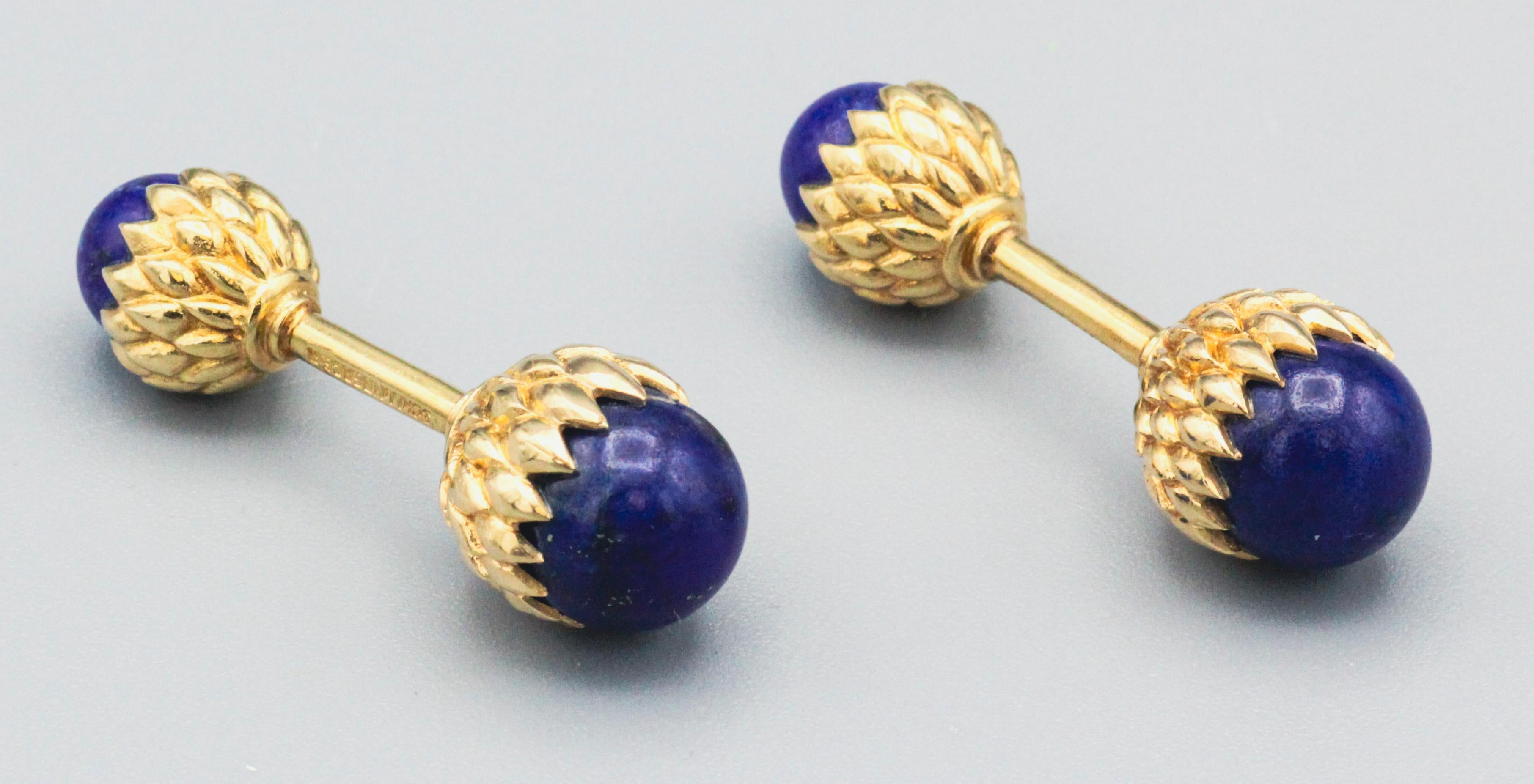 Elevate your style with the timeless sophistication of Tiffany & Co. Schlumberger Lapis 18k Gold Acorn Cufflinks. Exuding refinement and luxury, these cufflinks are a testament to impeccable craftsmanship and exquisite design.

Each cufflink